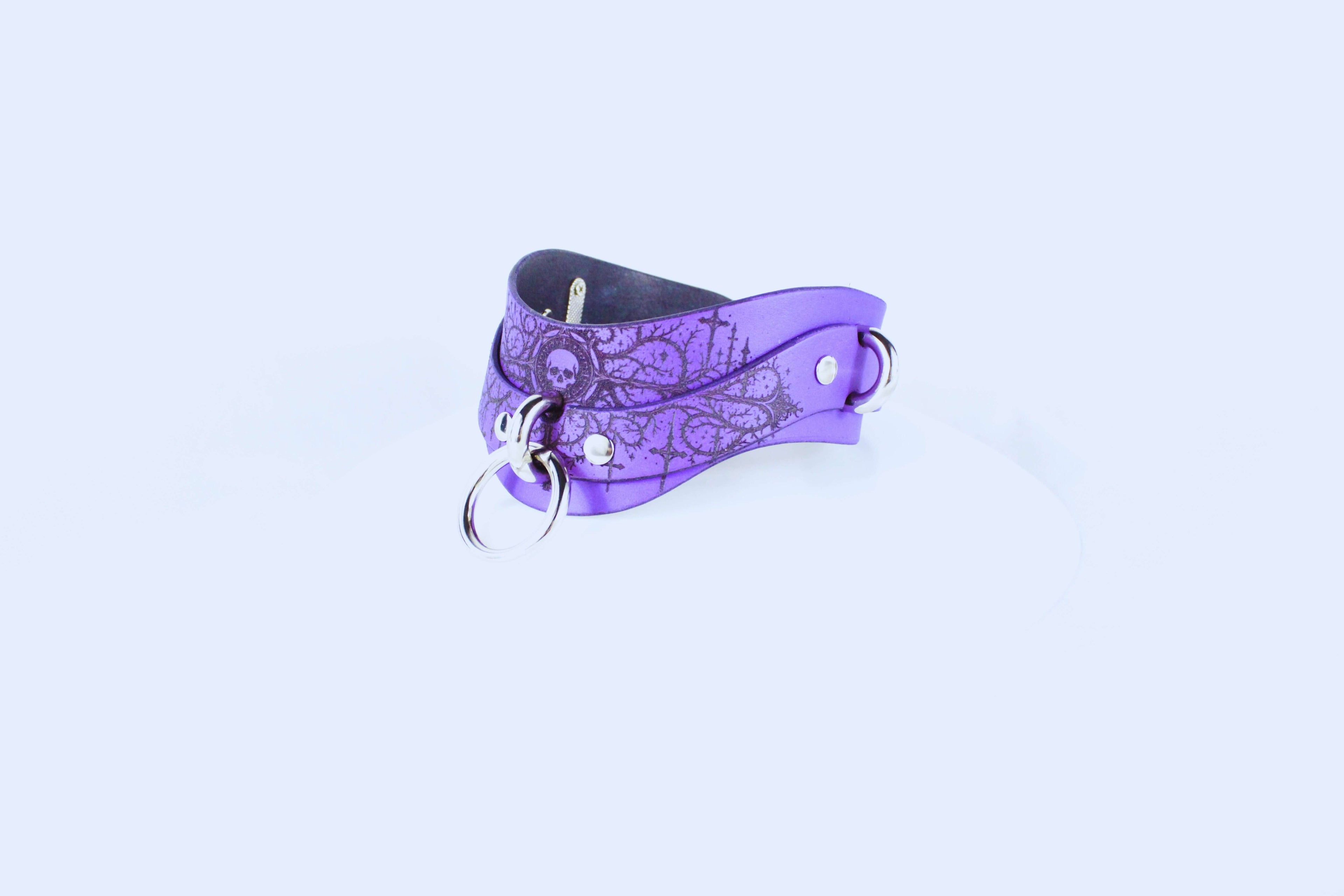 Gothic Skull BDSM Collar – handmade purple leather choker with O-ring, showcasing gothic design and wide posture style.