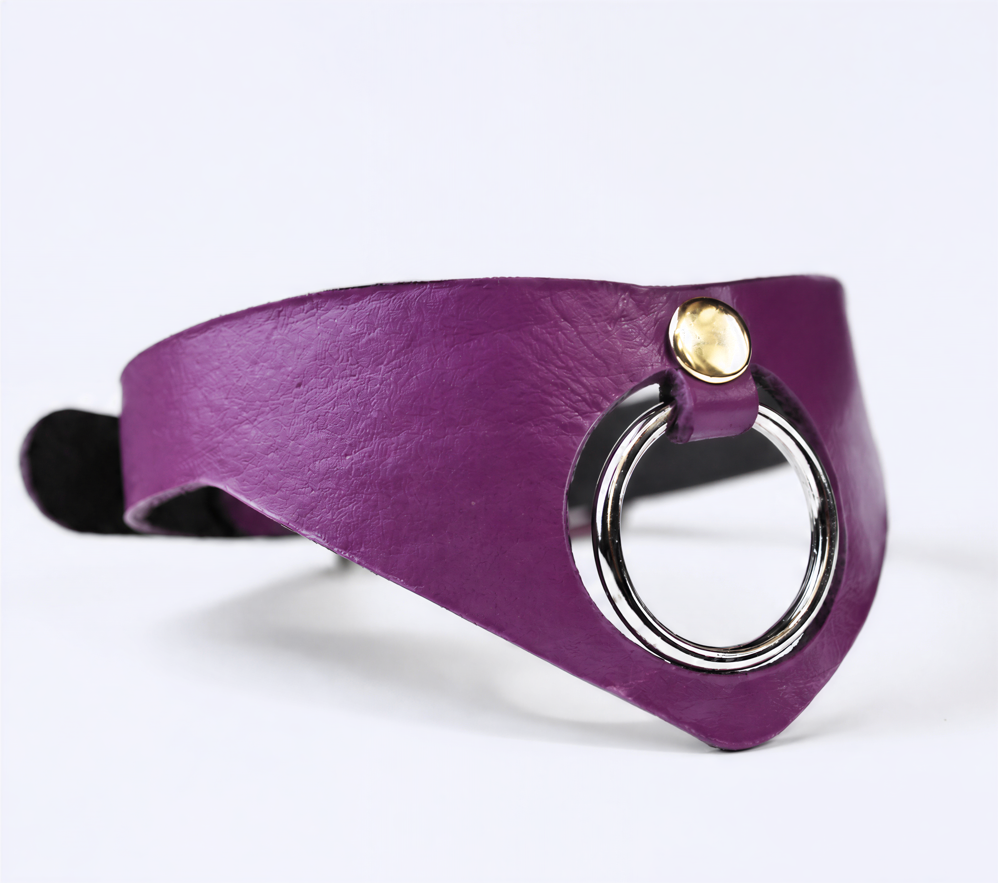 A purple leather choker necklace with a silver ring on the front.