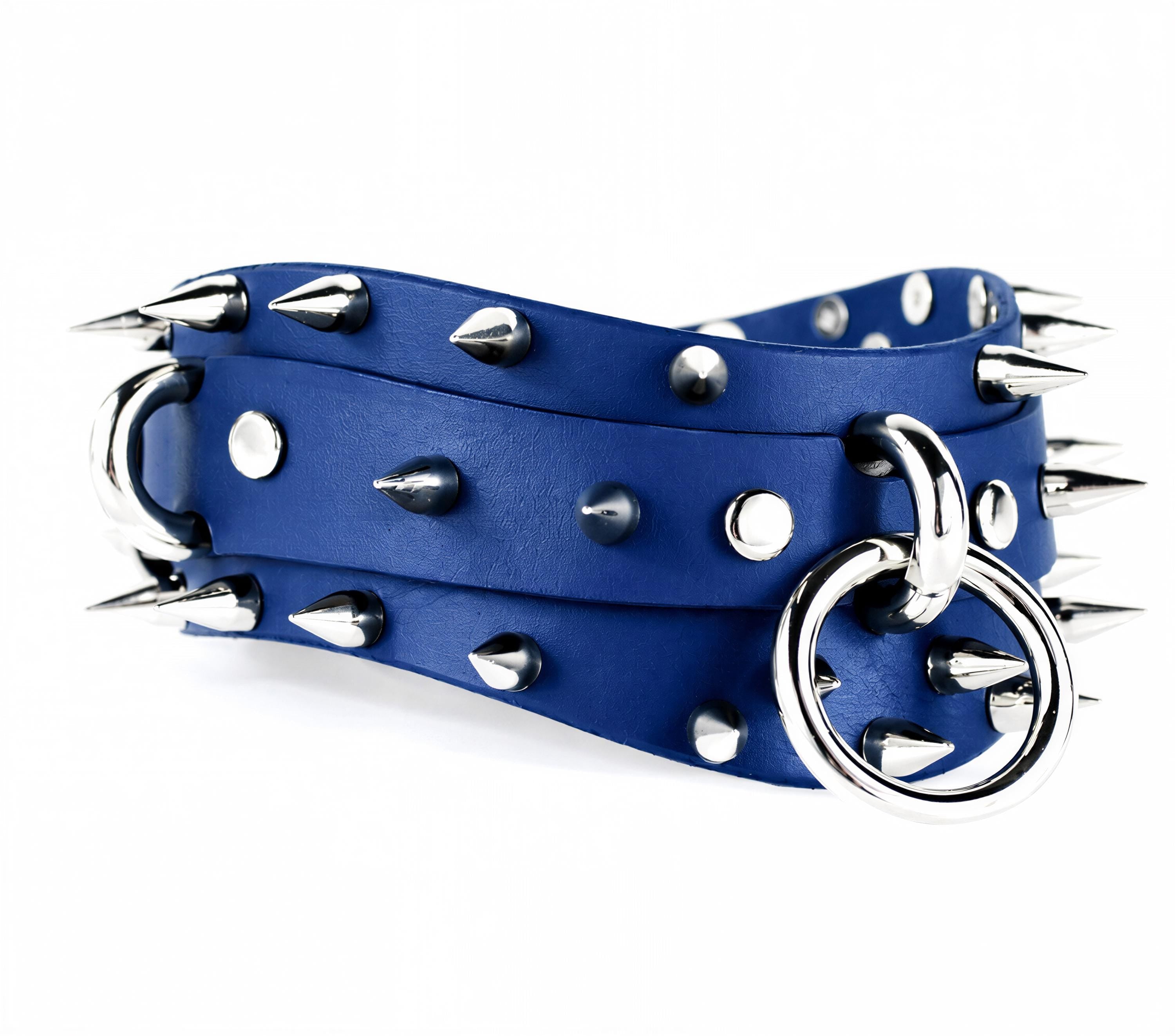A blue leather belt with silver spikes and a metal ring on it.