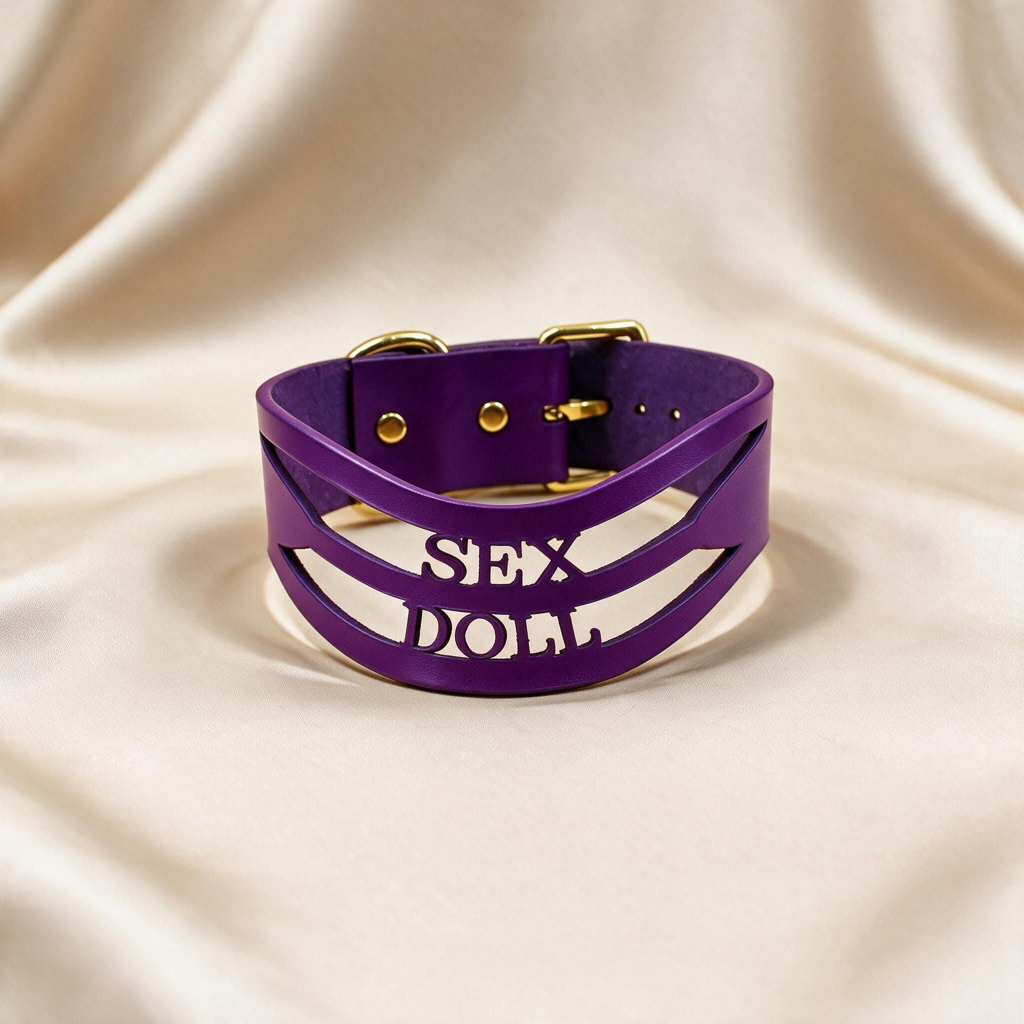 A purple choker necklace with the word "SEX" printed on it.