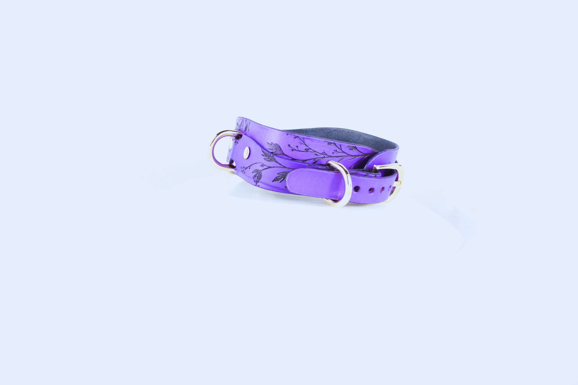 Purple Floral Submissive Collar with Gold O-Ring showcasing elegant floral design and premium leather craftsmanship.