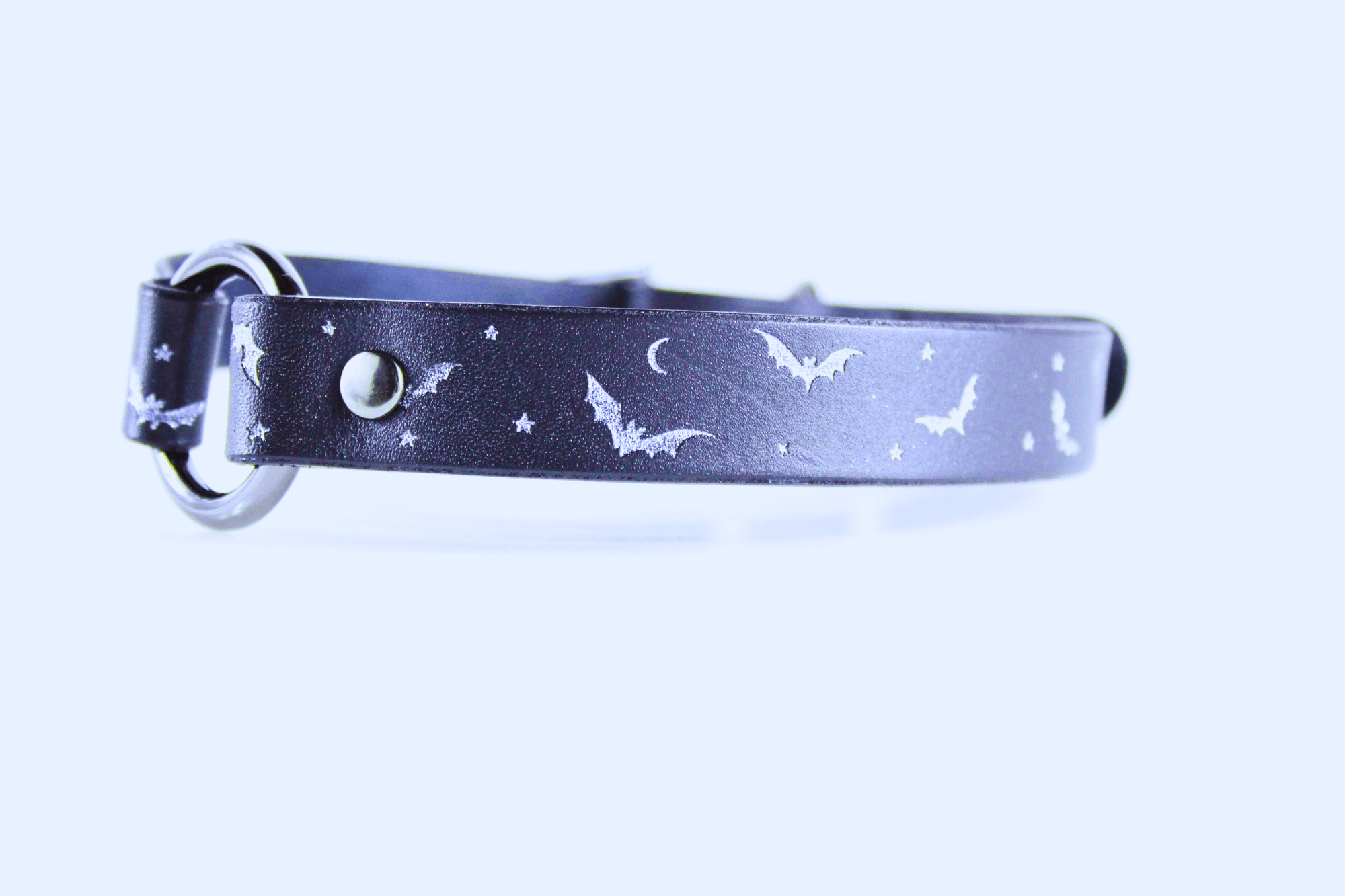 Bat and Moon Leather Choker showcasing bats, crescent moons, and stars on sleek black leather.