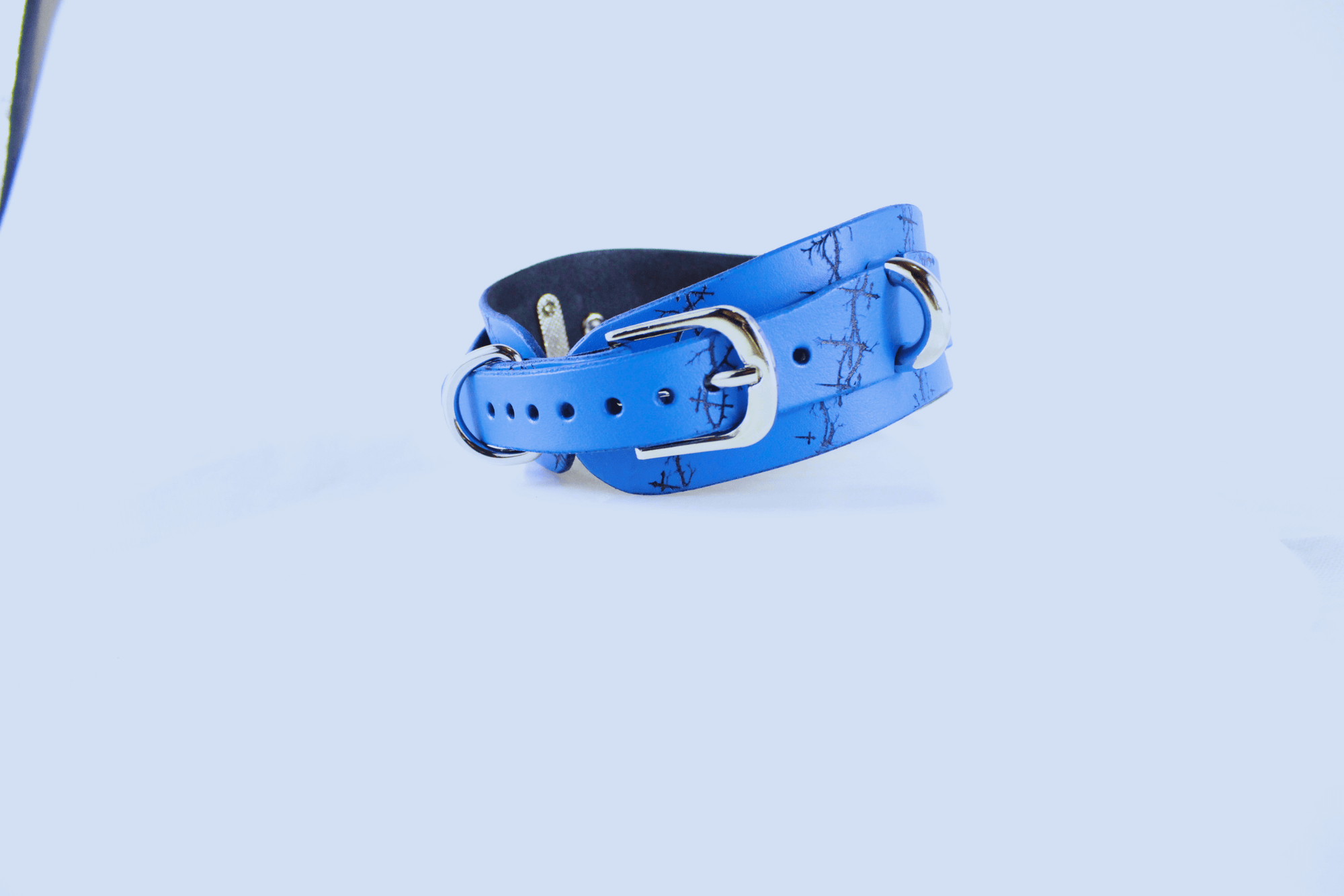 Barbed BDSM Collar - Blue Leather Submissive Collar with Rings, featuring polished rings and hand-finished detailing.