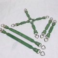 A group of green leather straps with metal heart-shaped buckles, arranged in a cross-like pattern on a white background.