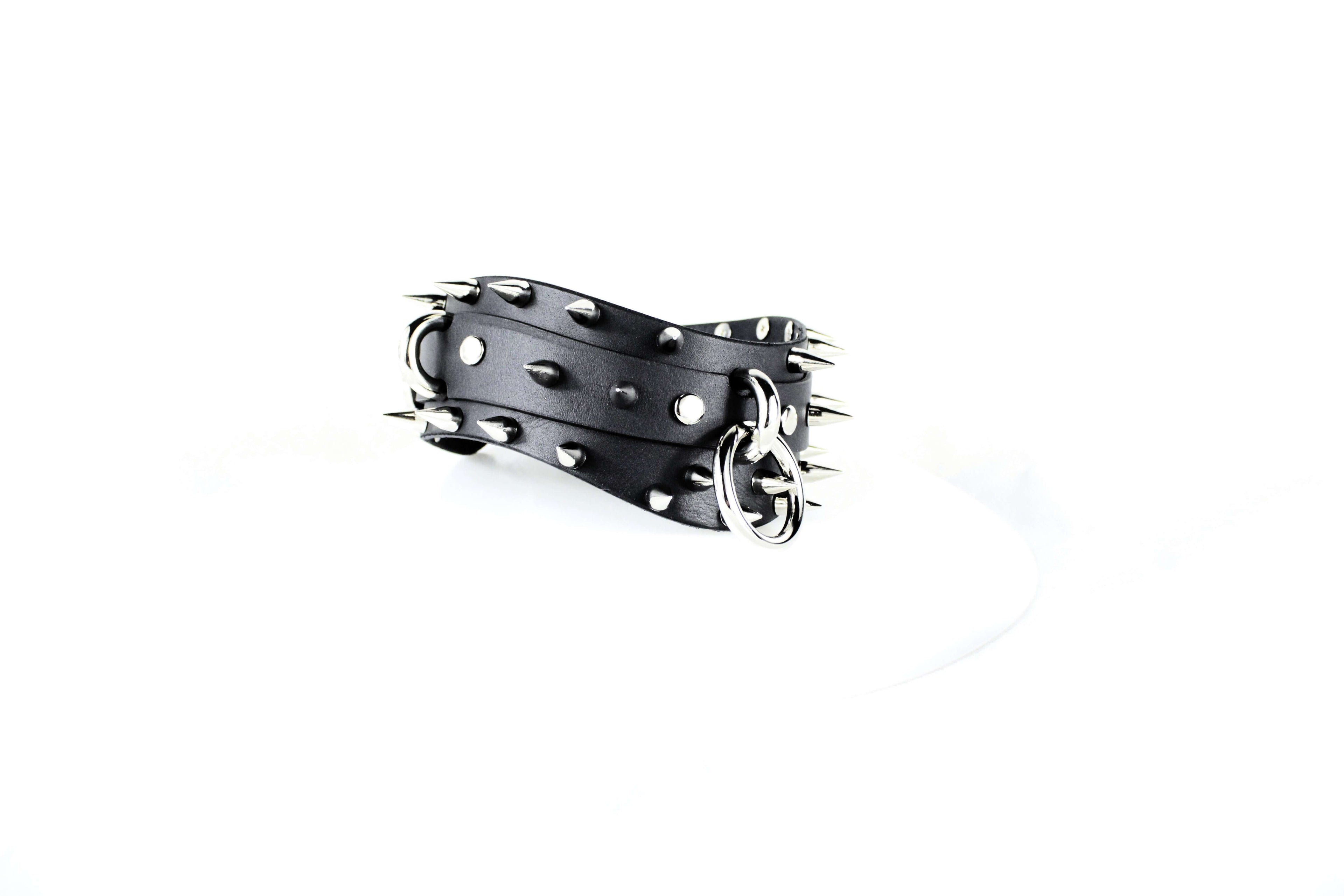 Spiked BDSM Collar featuring polished silver spikes on premium black leather, perfect for gothic style.