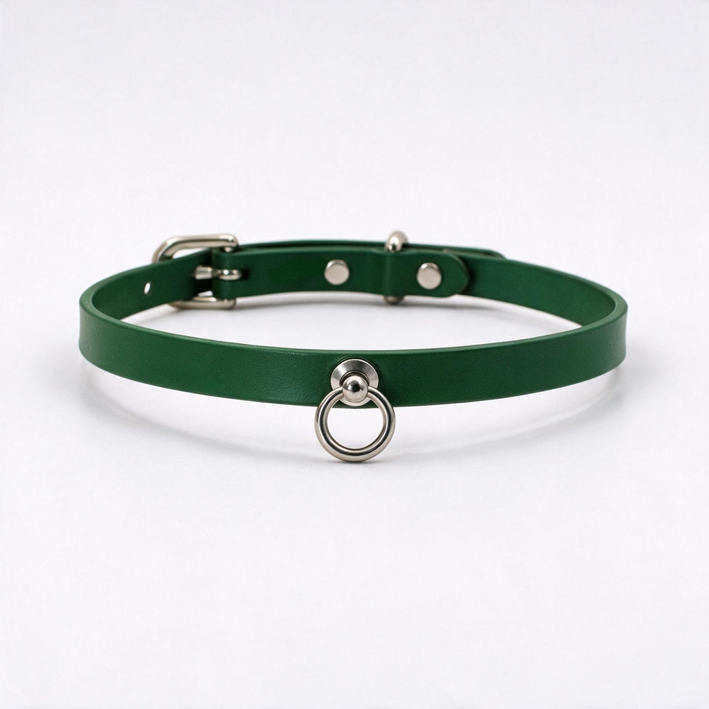 A green leather choker collar with a metal ring and buckle.