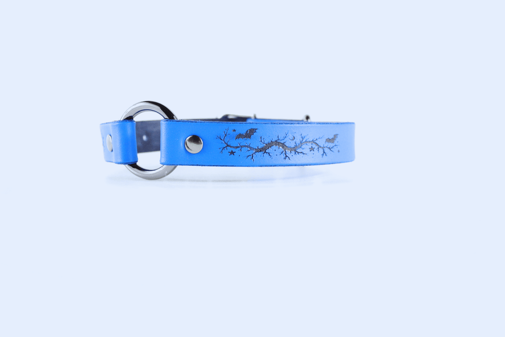 Submissive Collar Blue Moon & Bats Leather Choker with crescent moons and bats design in blue.