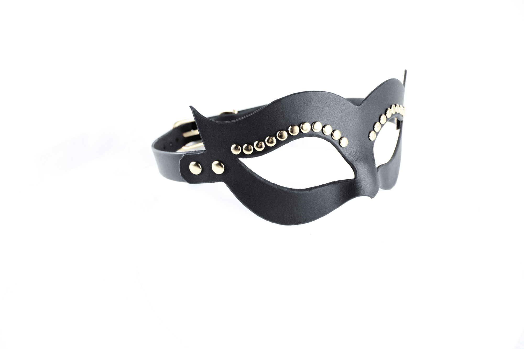 A black leather mask with gold studs on the sides.