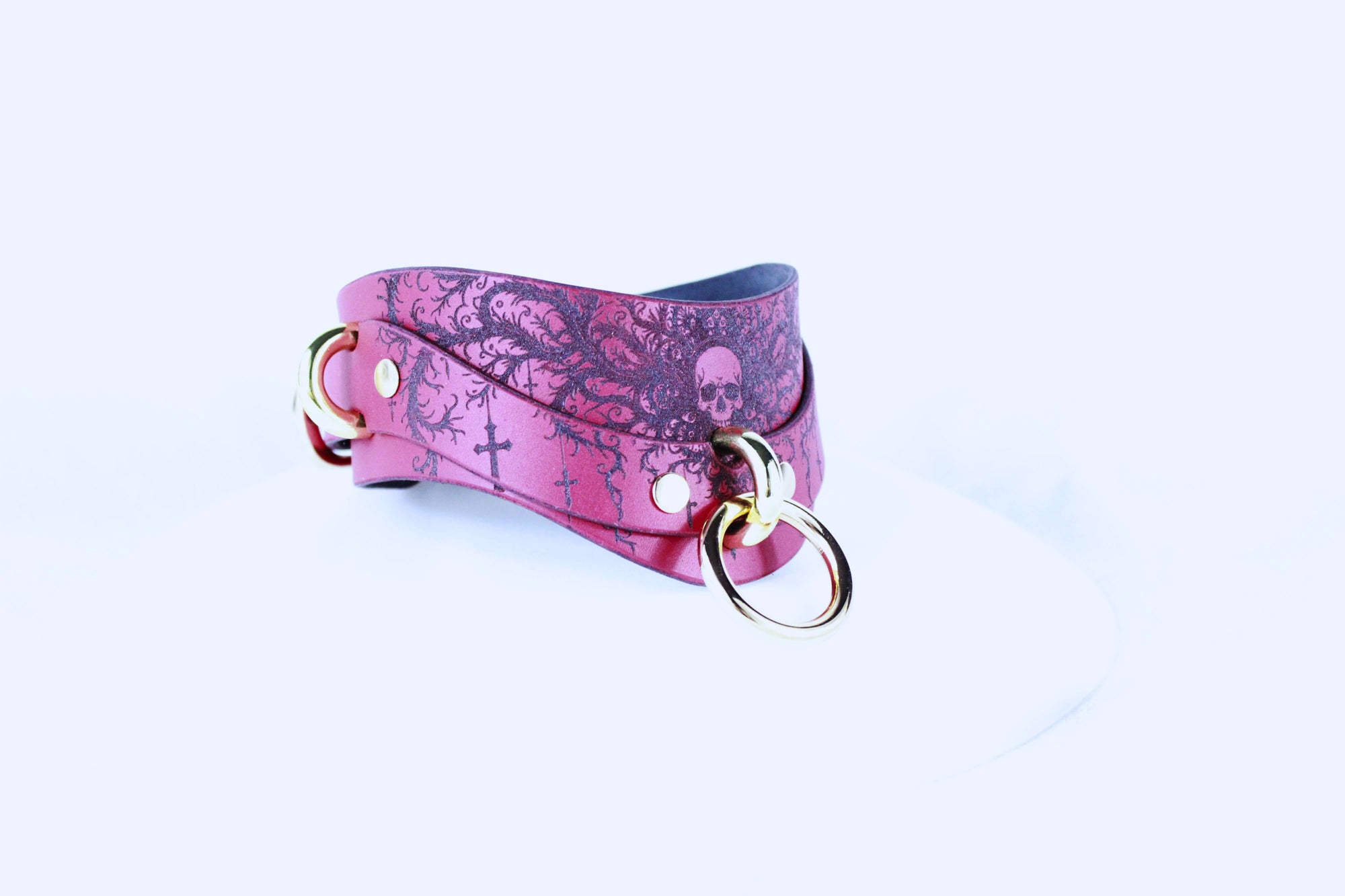 Gothic Skull Posture Collar – BDSM Leather Choker with cross and skull designs, handcrafted in crimson leather.