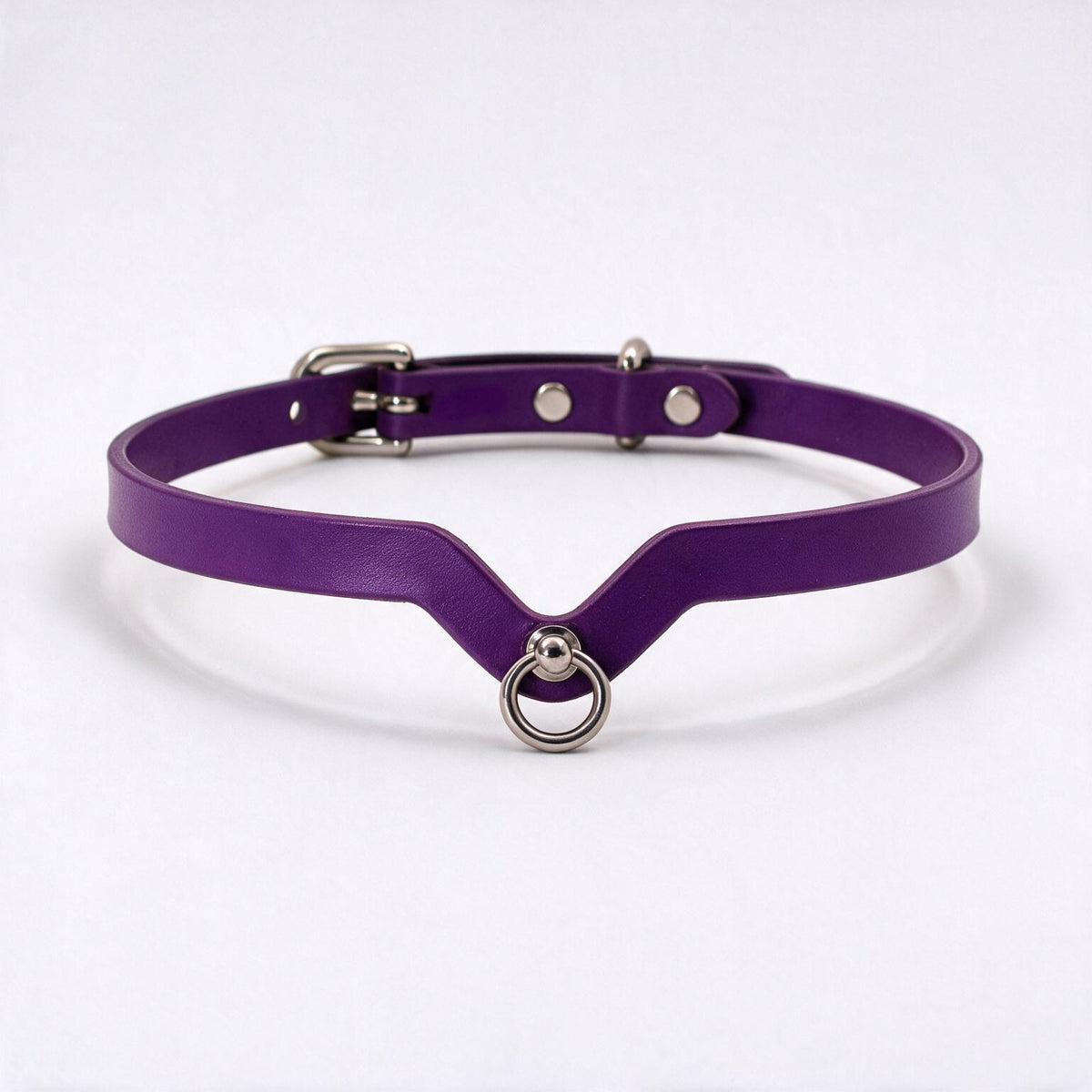 A purple leather choker necklace with a metal ring and buckle.