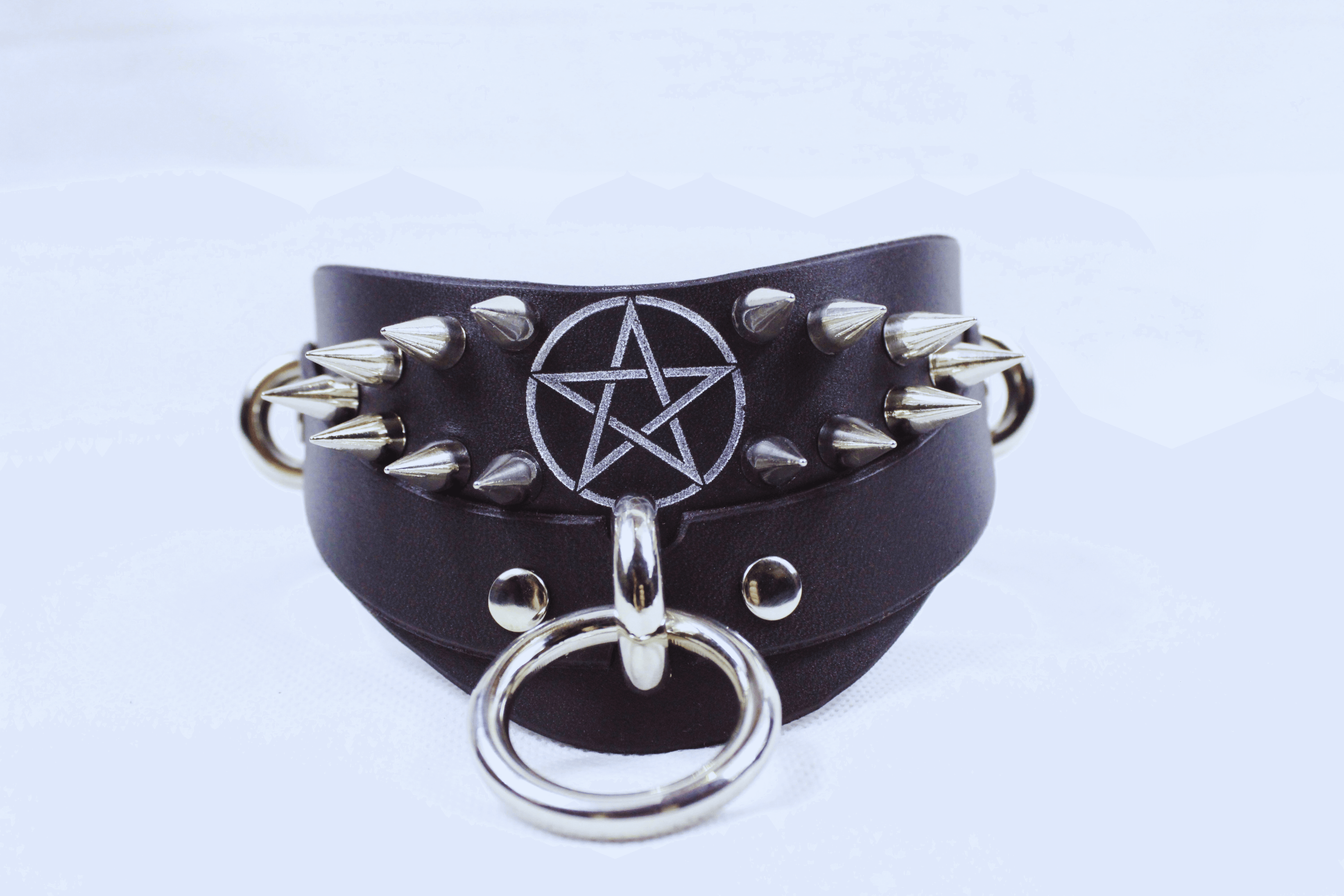 Pentagram BDSM Collar featuring sharp silver spikes and a pentagram design on premium black leather.