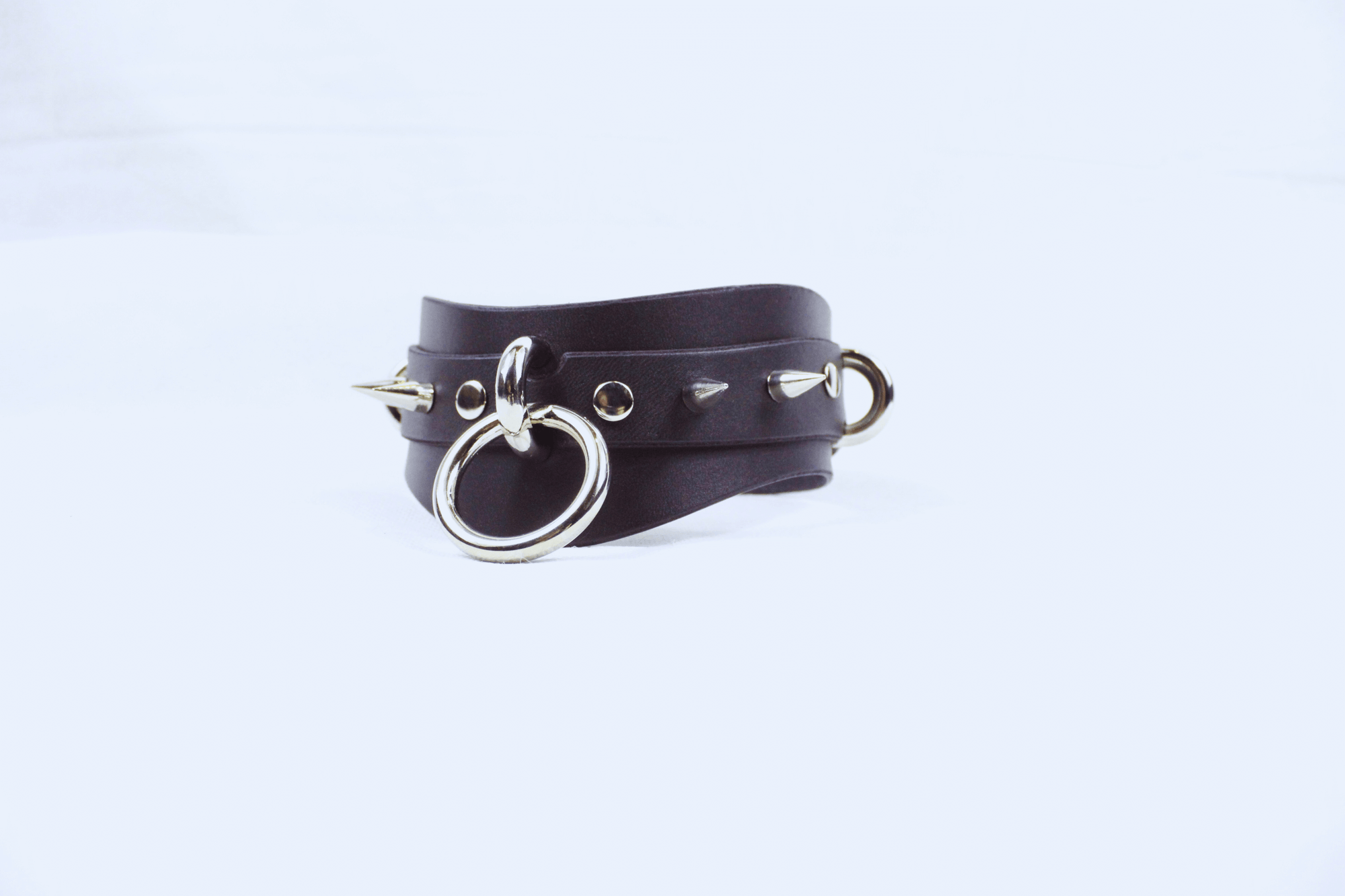 Spiked BDSM Collar – Wide Leather Posture Choker for Submissive Play with spikes and metal rings.