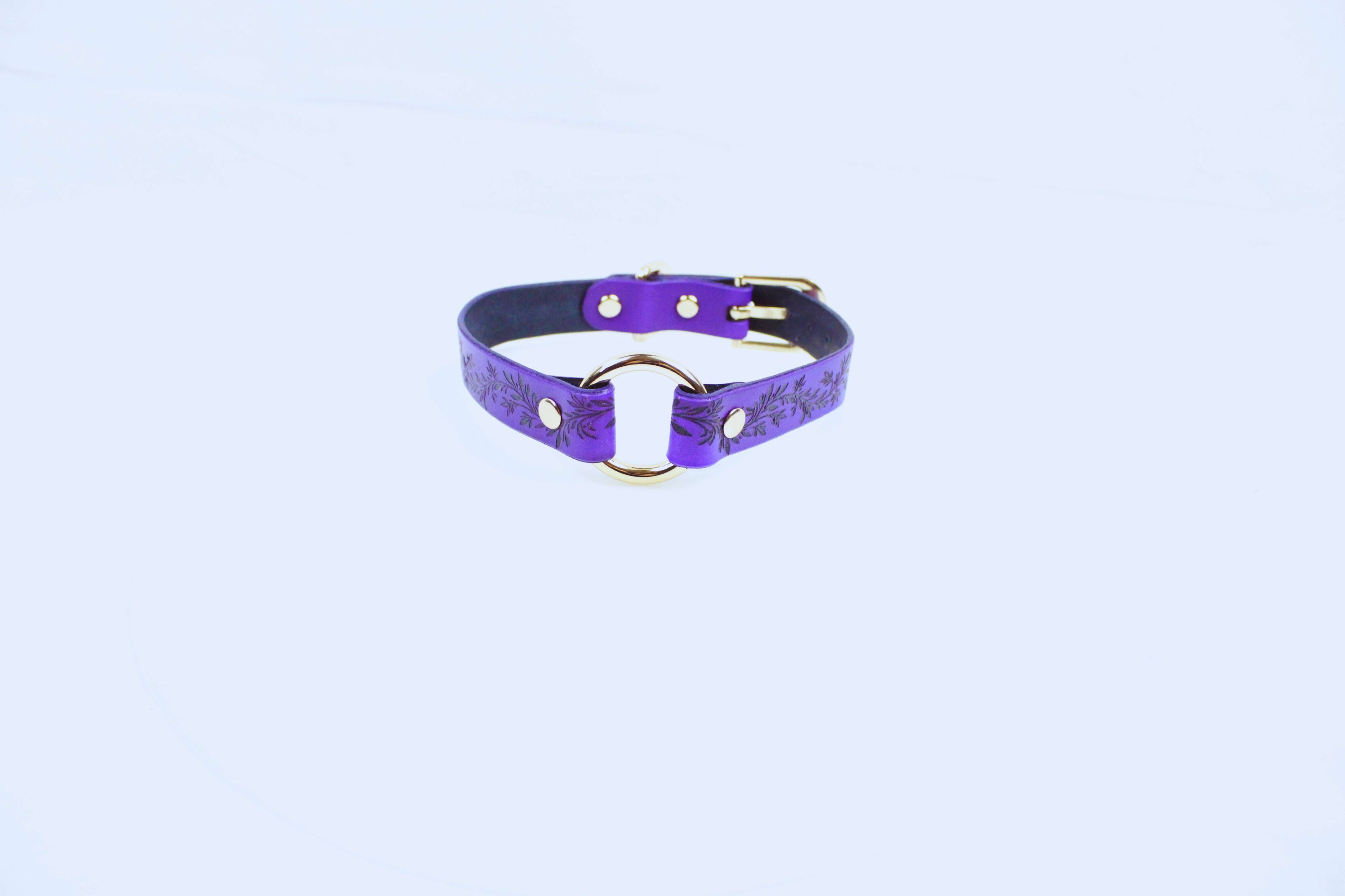 Leaf Pattern Submissive Day Collar in purple leather with gold accents, showcasing elegant design and discreet style.