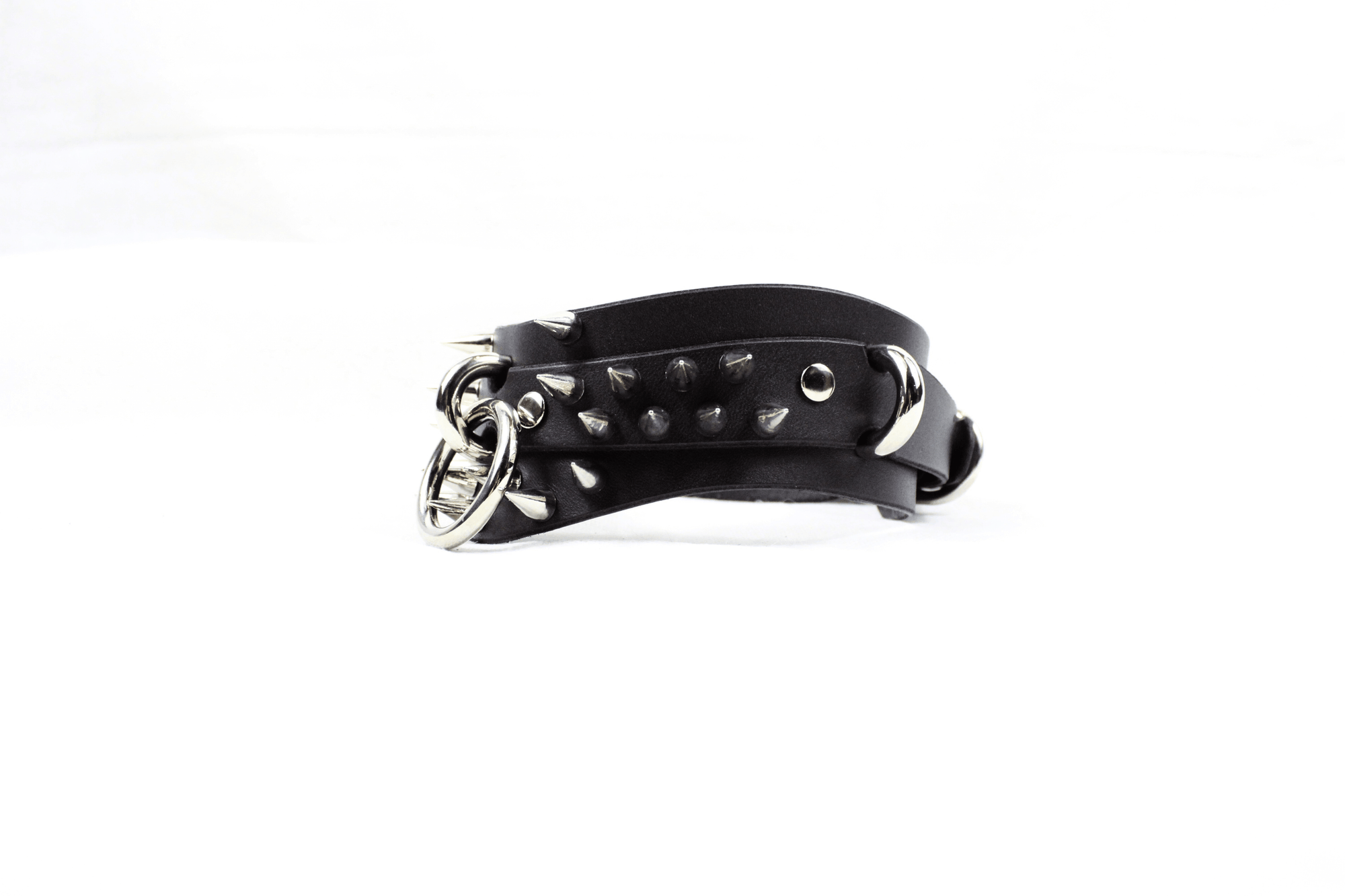 Spiked Posture BDSM Collar featuring spikes, O-rings, and dark leather design for gothic submissive style.