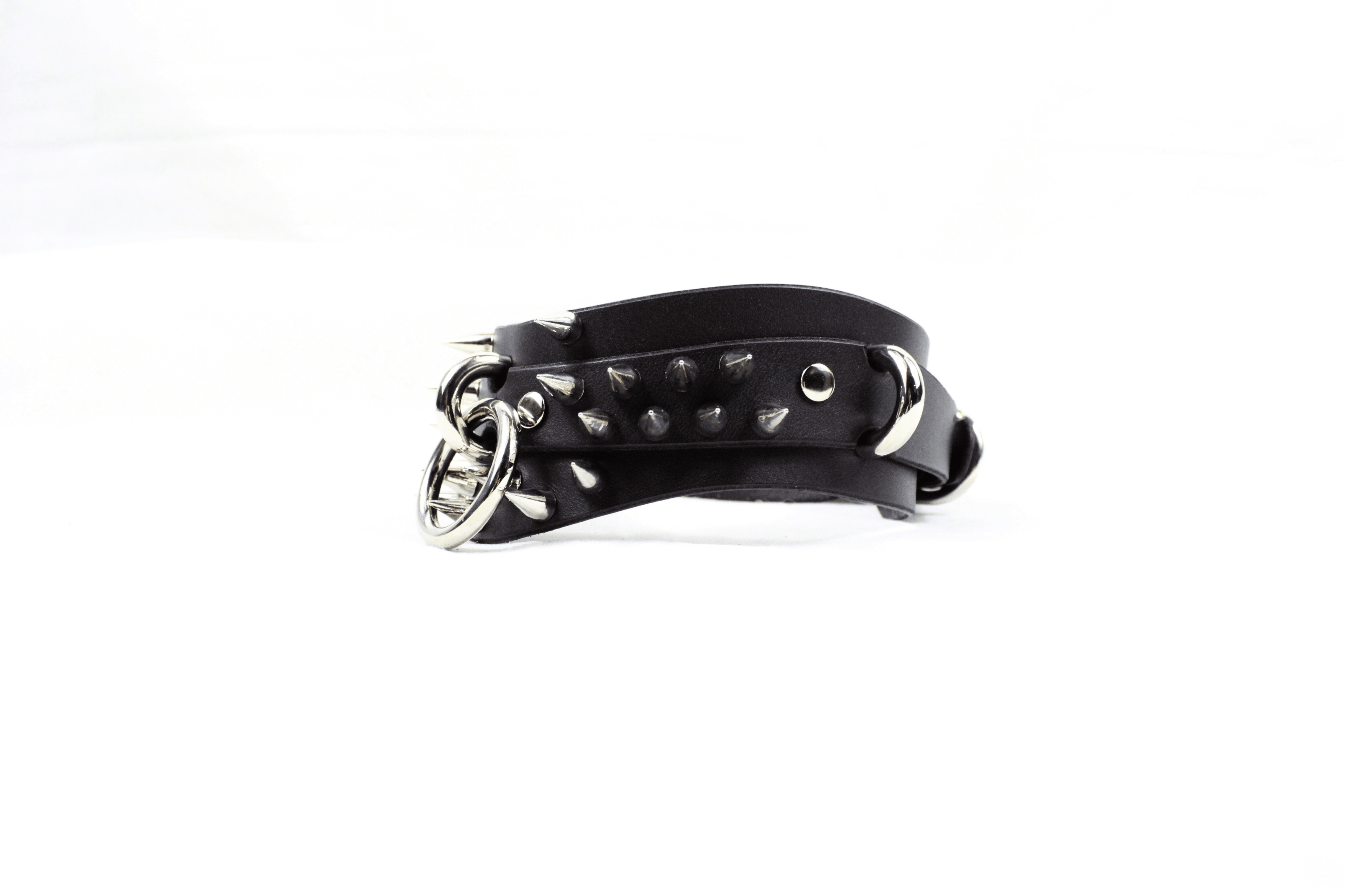 Spiked Posture BDSM Collar featuring spikes, O-rings, and dark leather design for gothic submissive style.