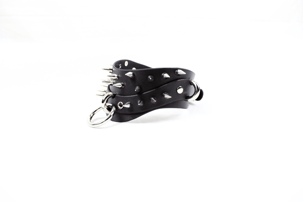 Black Spiked BDSM Collar showcased in premium leather with spikes, designed for gothic submissive fashion.