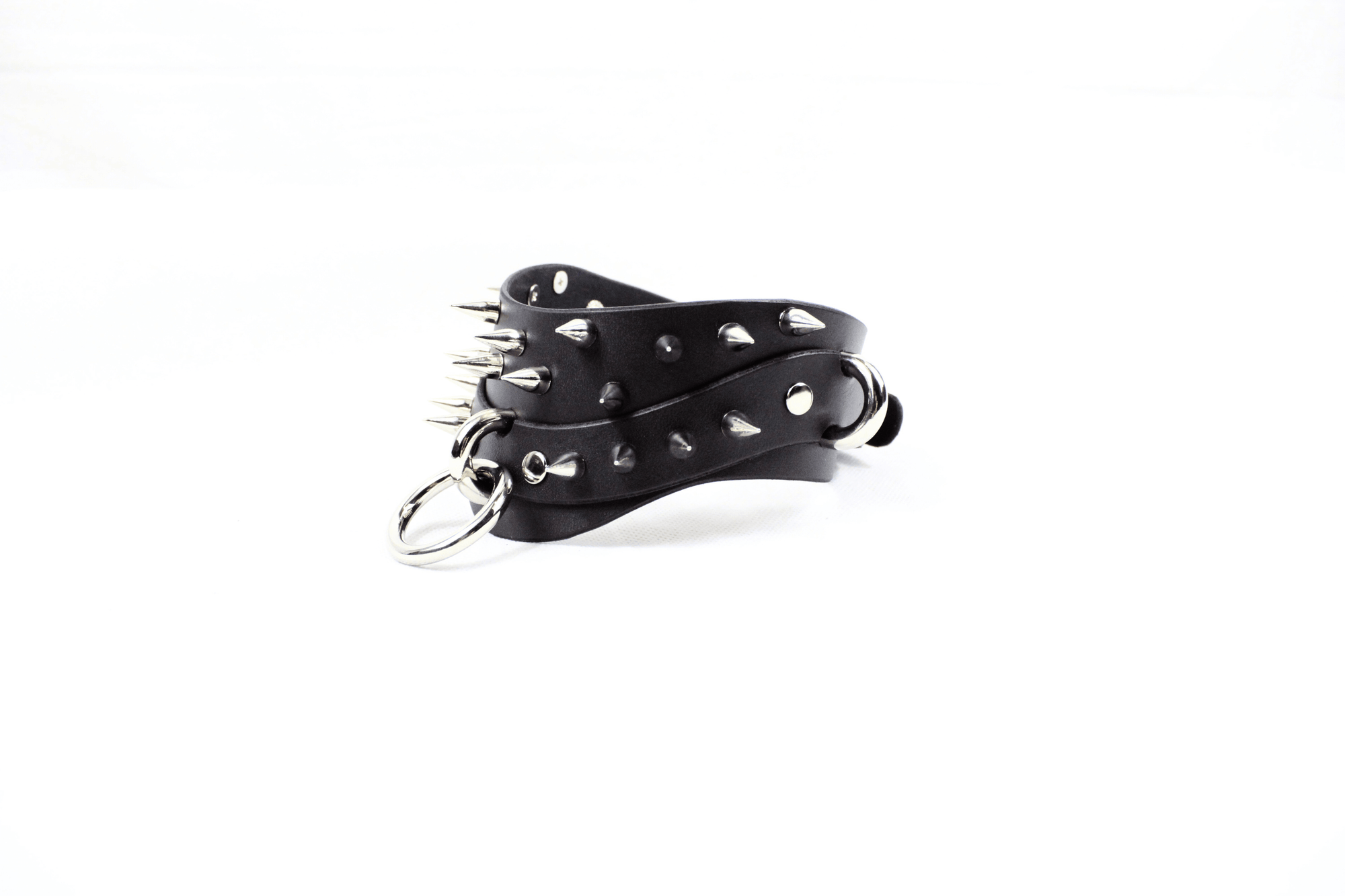 Black Spiked BDSM Collar showcased in premium leather with spikes, designed for gothic submissive fashion.