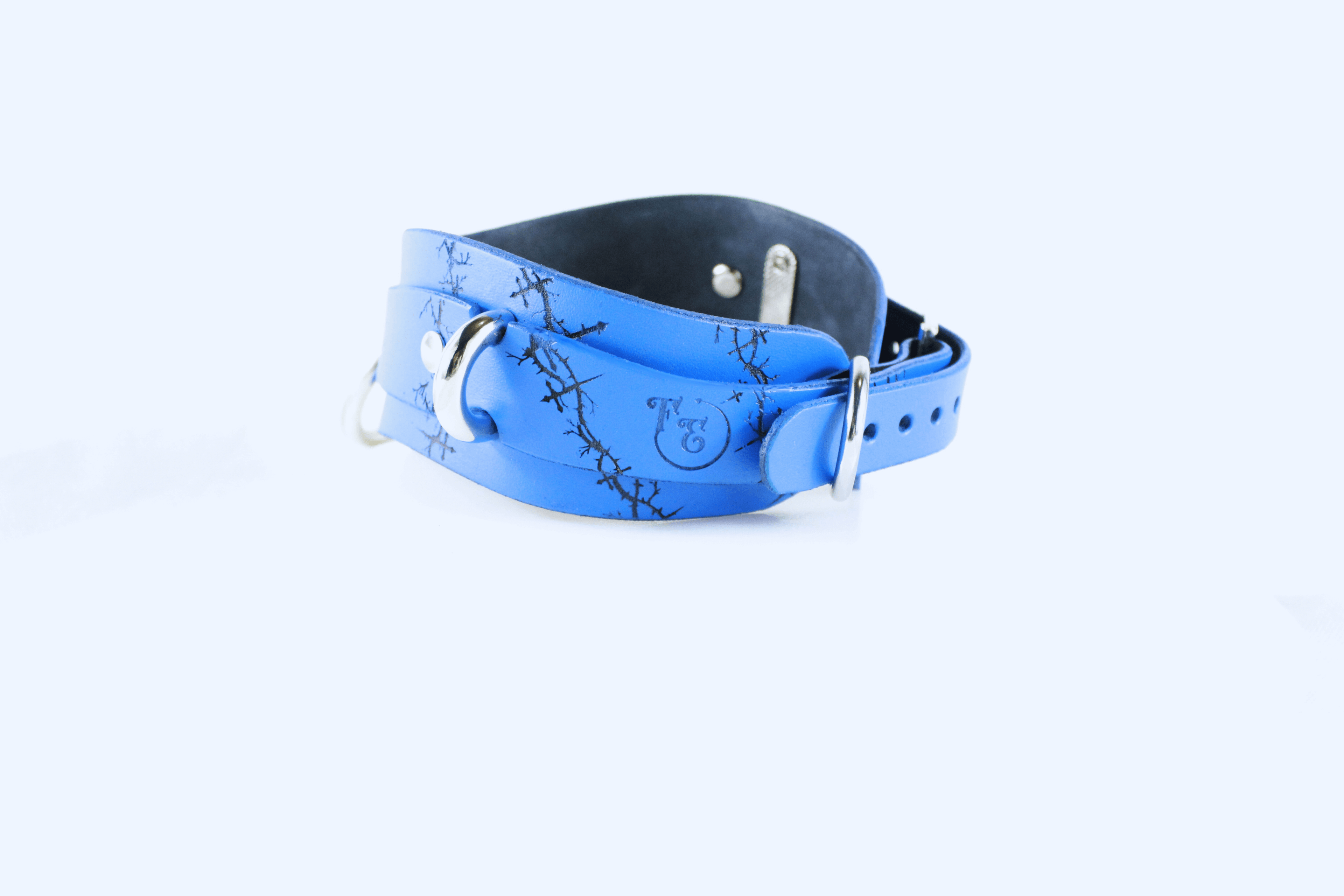 Barbed BDSM Collar – Blue Leather Submissive Collar with Rings, handcrafted with barbed motif and polished rings.