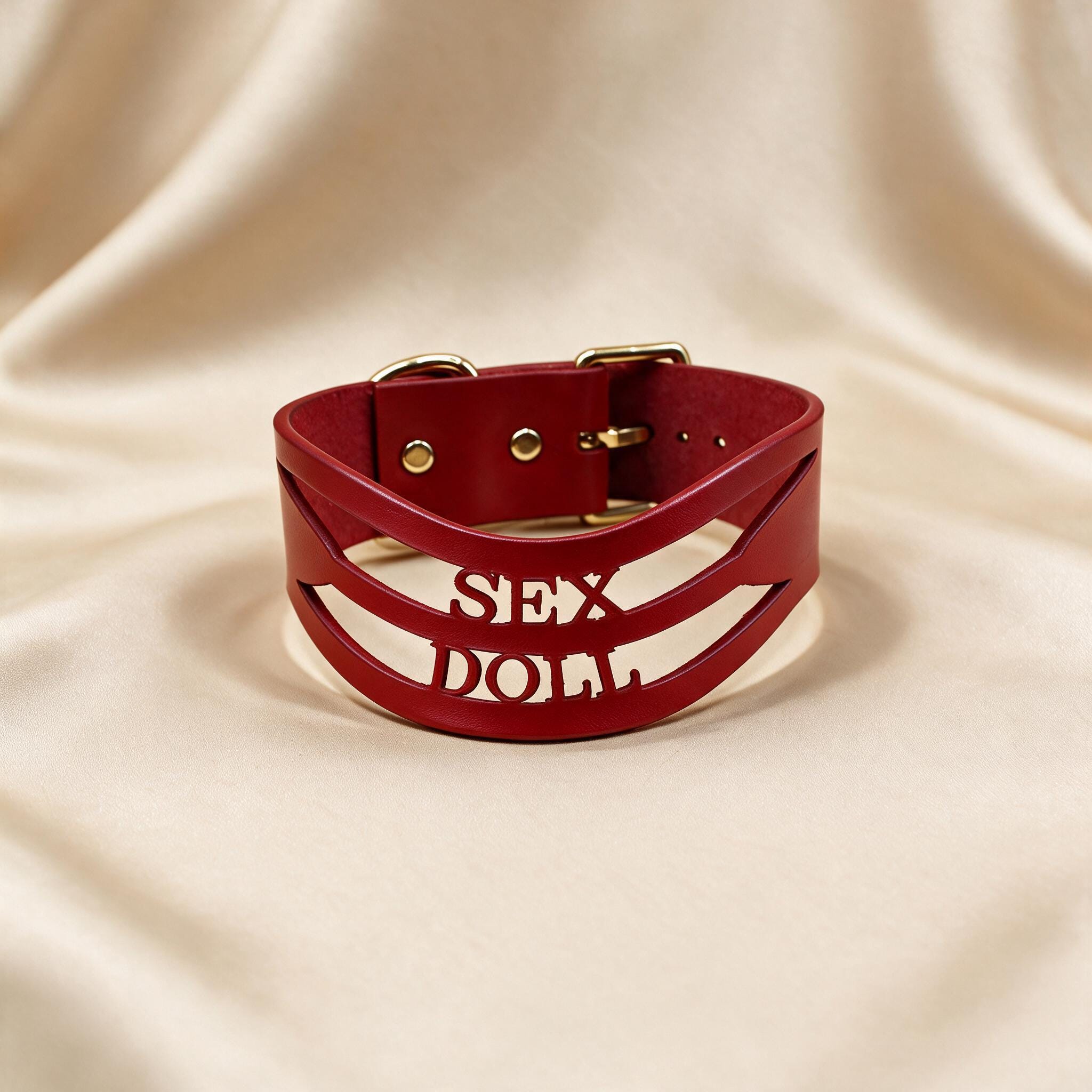 A red leather choker necklace with the word "SEX" printed on it.