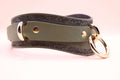 Avocado green leather choker with gold hardware, designed as a stylish submissive necklace.