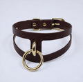 A dark brown leather choker necklace with a gold-colored metal ring and buckle.
