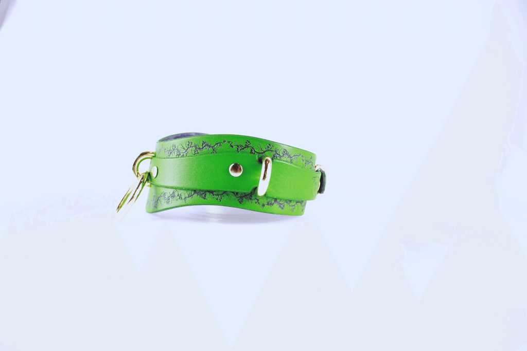 Skull Leather Choker in vibrant green with floral skull motif and gold accents.