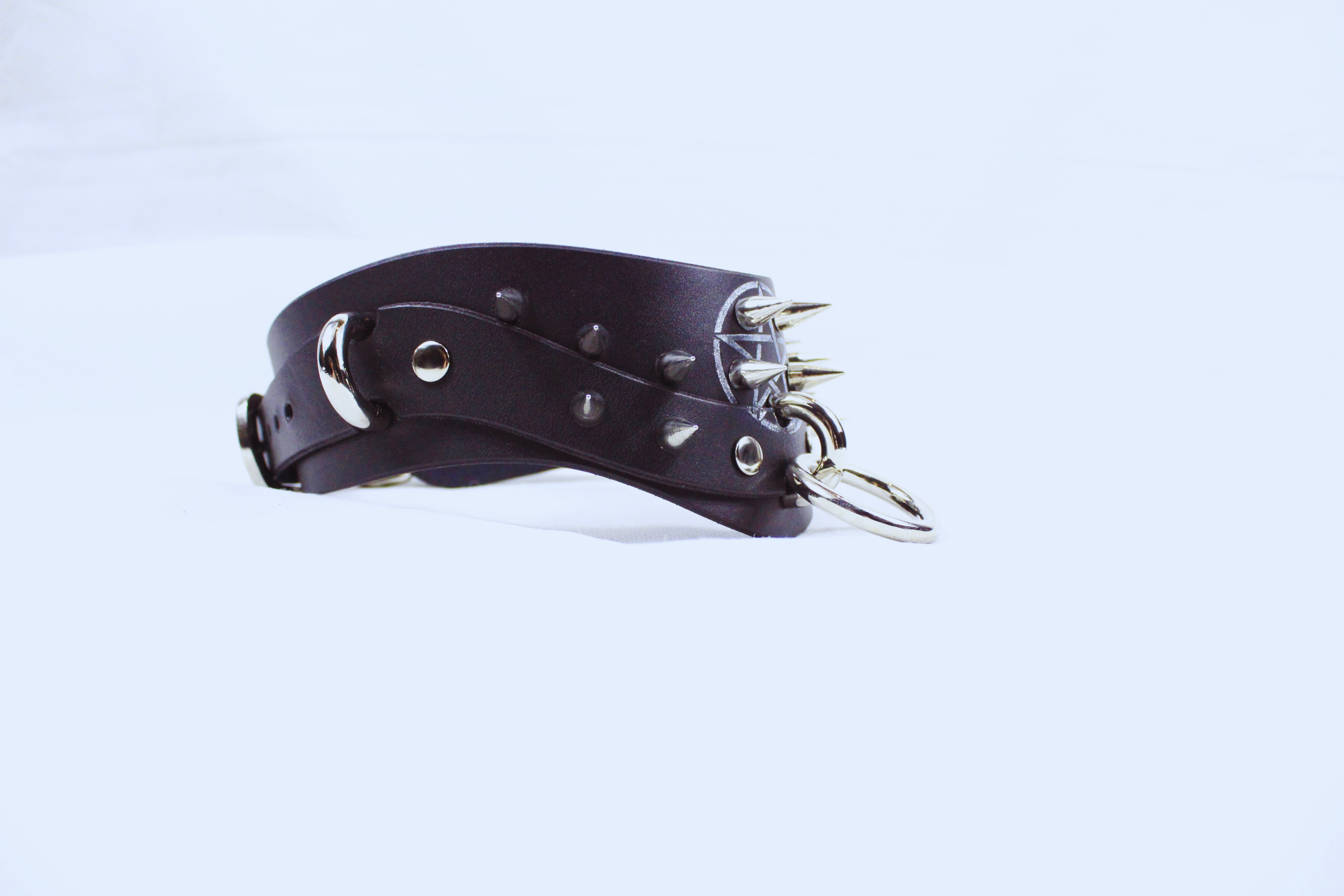 Pentagram BDSM Collar – Spiked Posture Submissive Choker with O-Rings displayed on a white background.