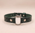 A green leather choker collar with a metal ring and two metal buttons.
