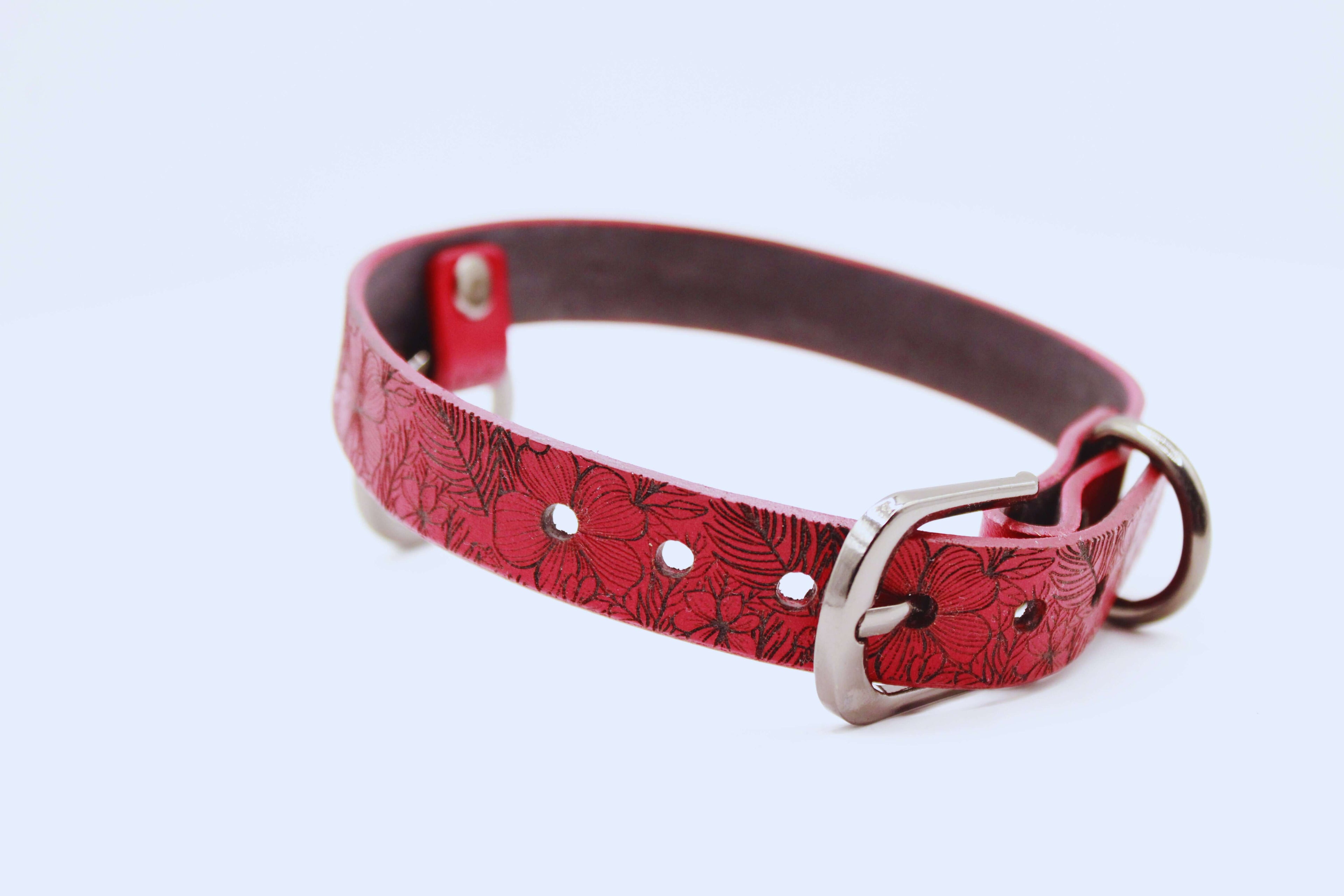 Handmade red floral leather choker with silver buckle, perfect for a subtle yet elegant accessory.