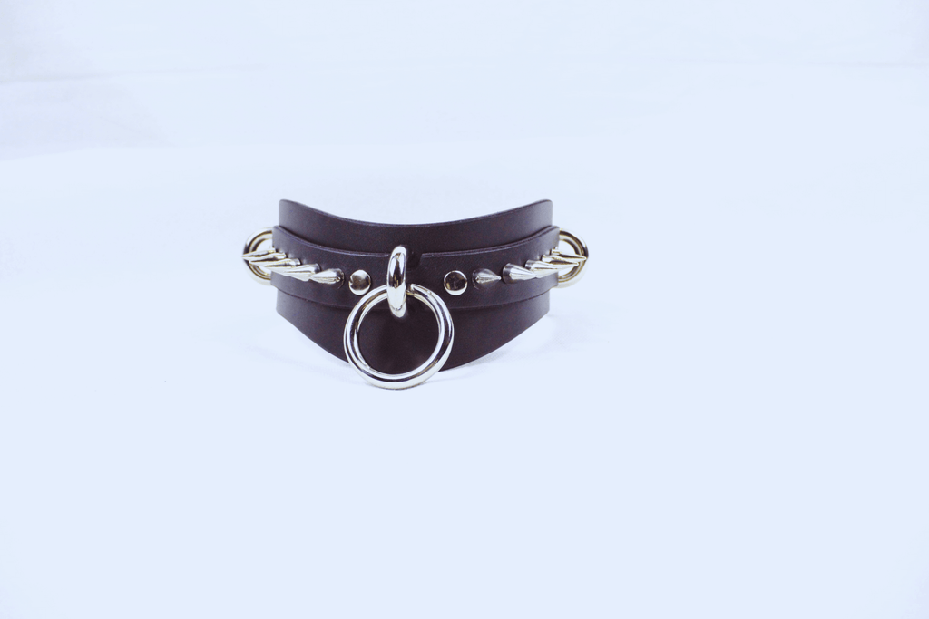 Obsidian BDSM Collar featuring dual stainless-steel rings and matte black leather design, perfect for gothic style and submission.