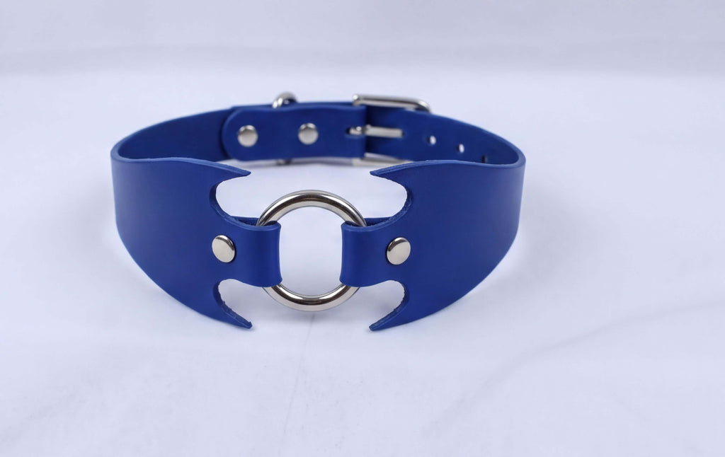 A blue leather choker necklace with a silver metal ring and buckle.