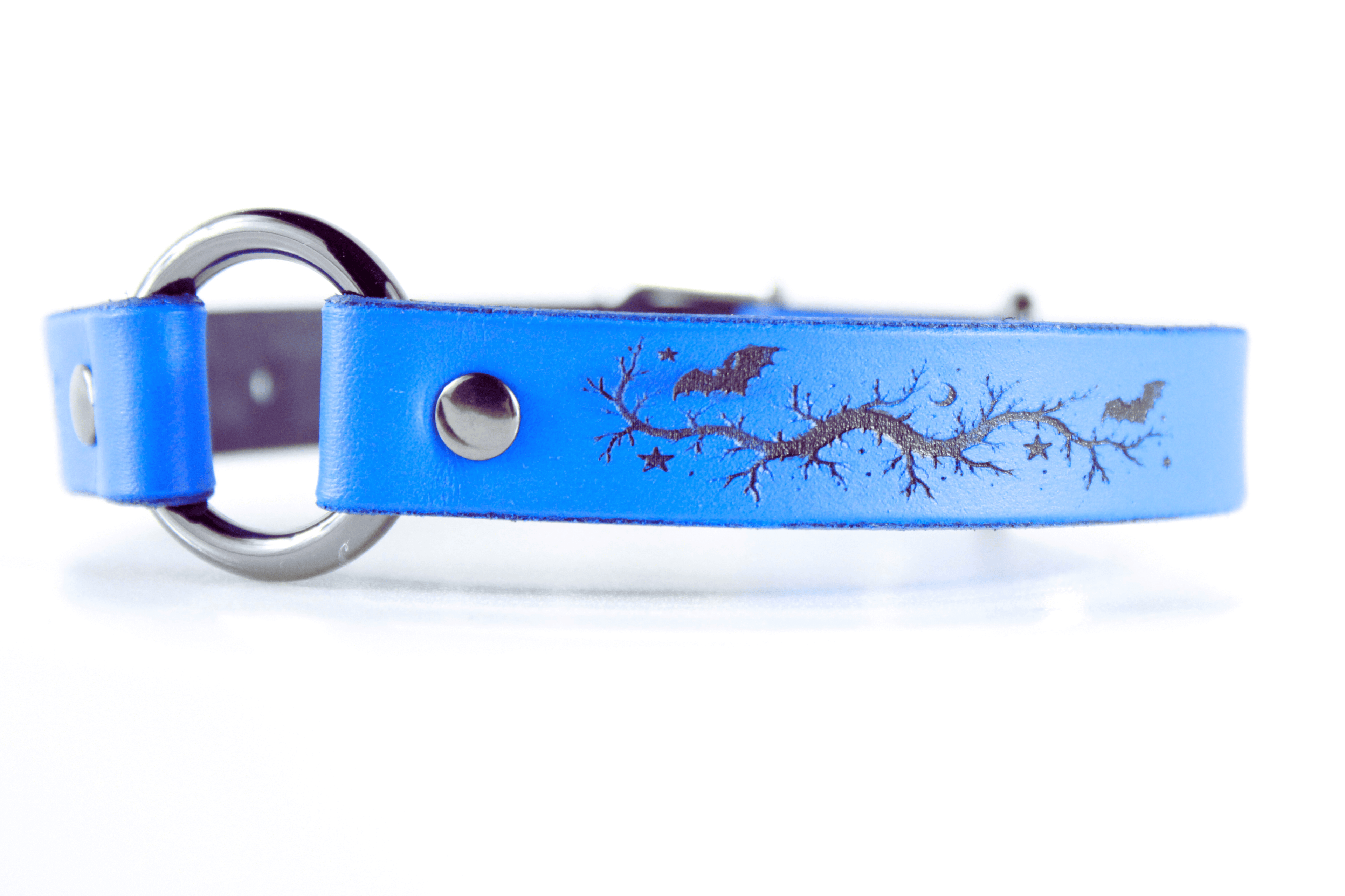 Submissive Collar Blue Moon & Bats Leather Choker featuring bats and star designs on a blue leather band.