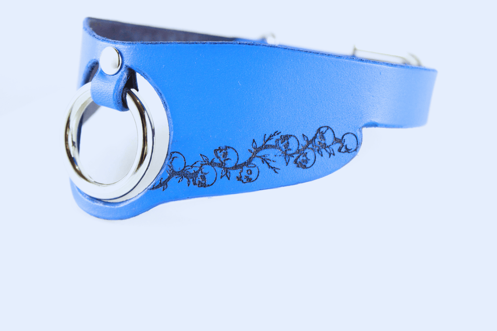 Submissive Collar with floral pattern, blue leather design featuring a metal ring, ideal for discreet day wear.