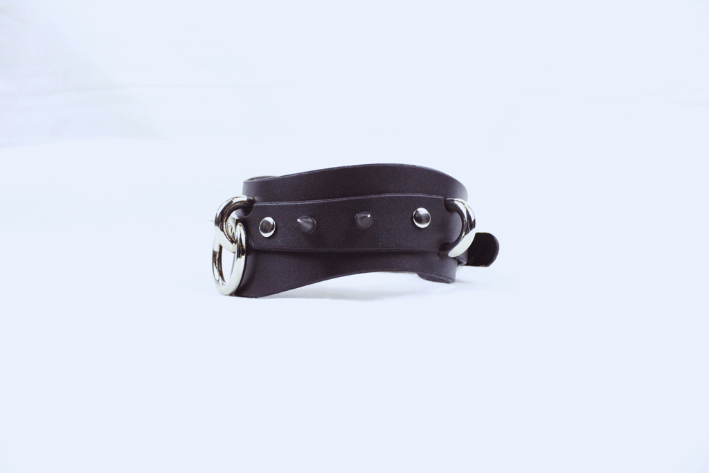 Spiked BDSM Collar – Wide Leather Posture Choker for Submissive Play, showcasing durable black leather with silver accents.