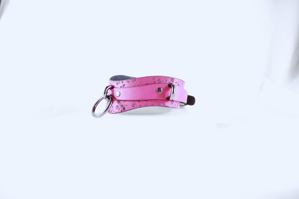 Rose Leather Submissive Collar in soft pink leather with a silver ring and studs for discreet day wear.
