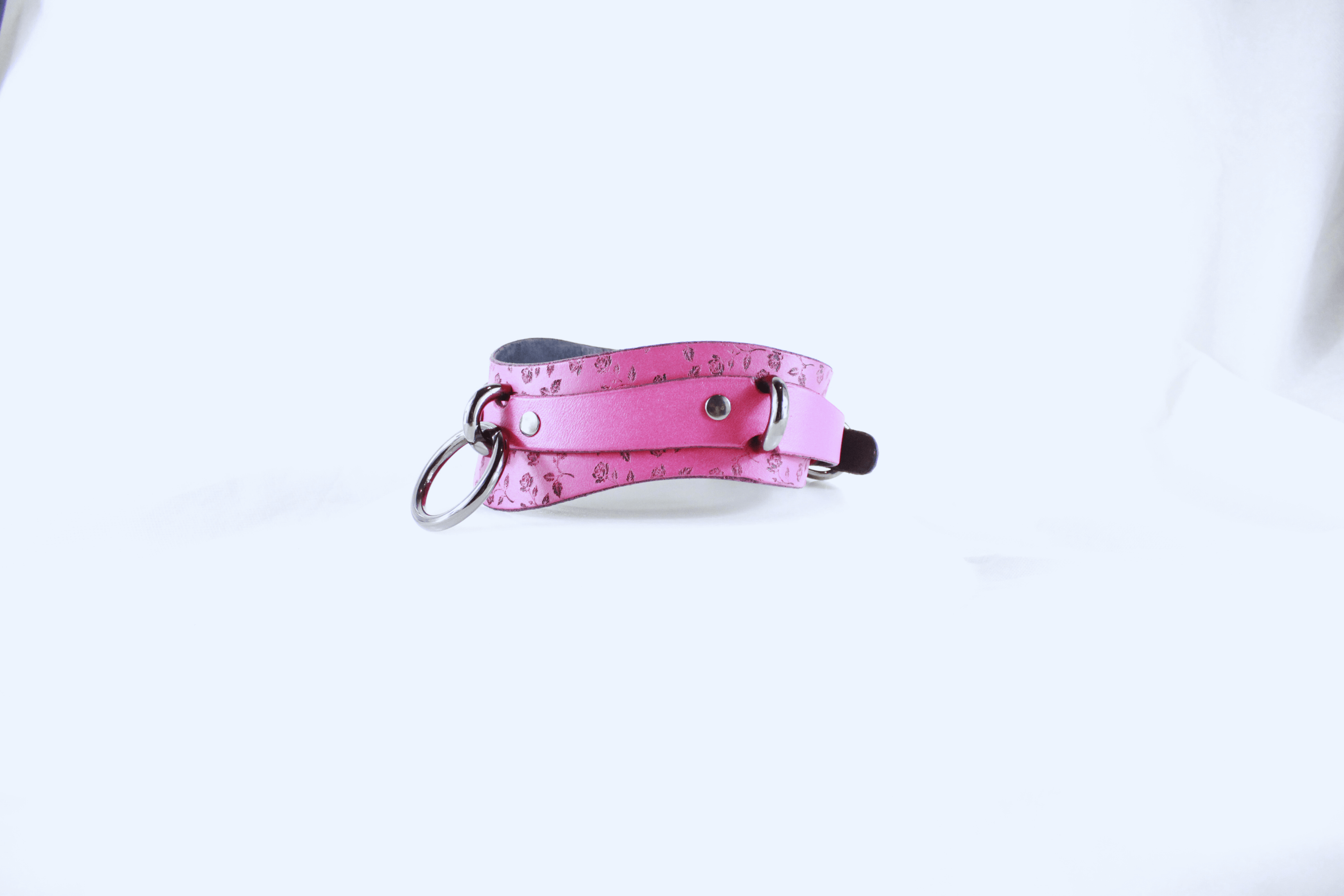 Rose Leather Submissive Collar in soft pink leather with a silver ring and studs for discreet day wear.