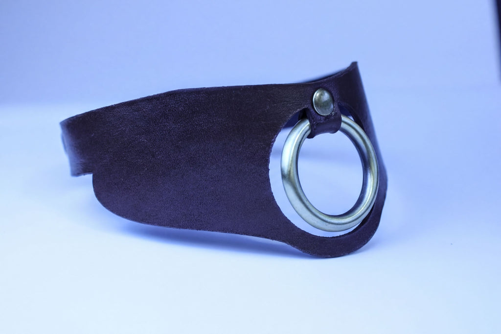 Minimalist leather posture collar with O-ring, perfect for BDSM jewelry and submissive day wear.