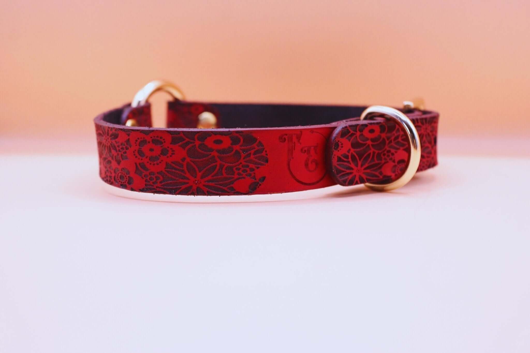 Handmade red floral leather collar with golden hardware, perfect for discreet sub wear and BDSM day collar styles.