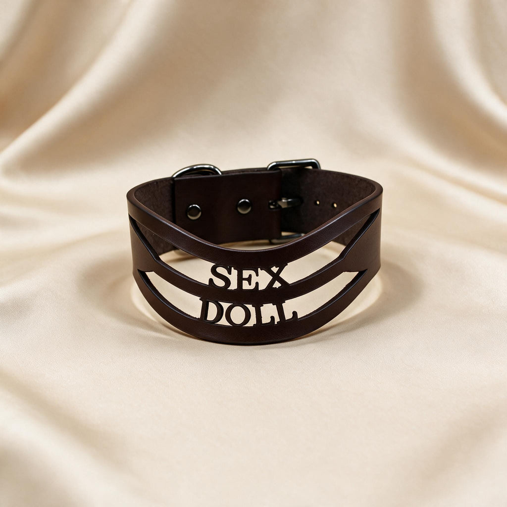 A black leather choker necklace with the word "SEX" printed on it.