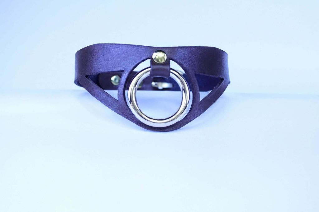 Sleek leather BDSM collar with bold O-ring, perfect for submissive jewelry and posture collar for bondage play.