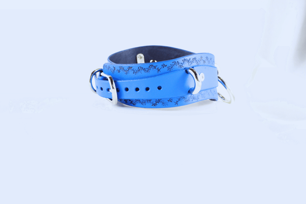 Floral Vine Posture Collar Discreet Leather Choker with O-Ring in blue, showcasing a delicate floral vine motif.