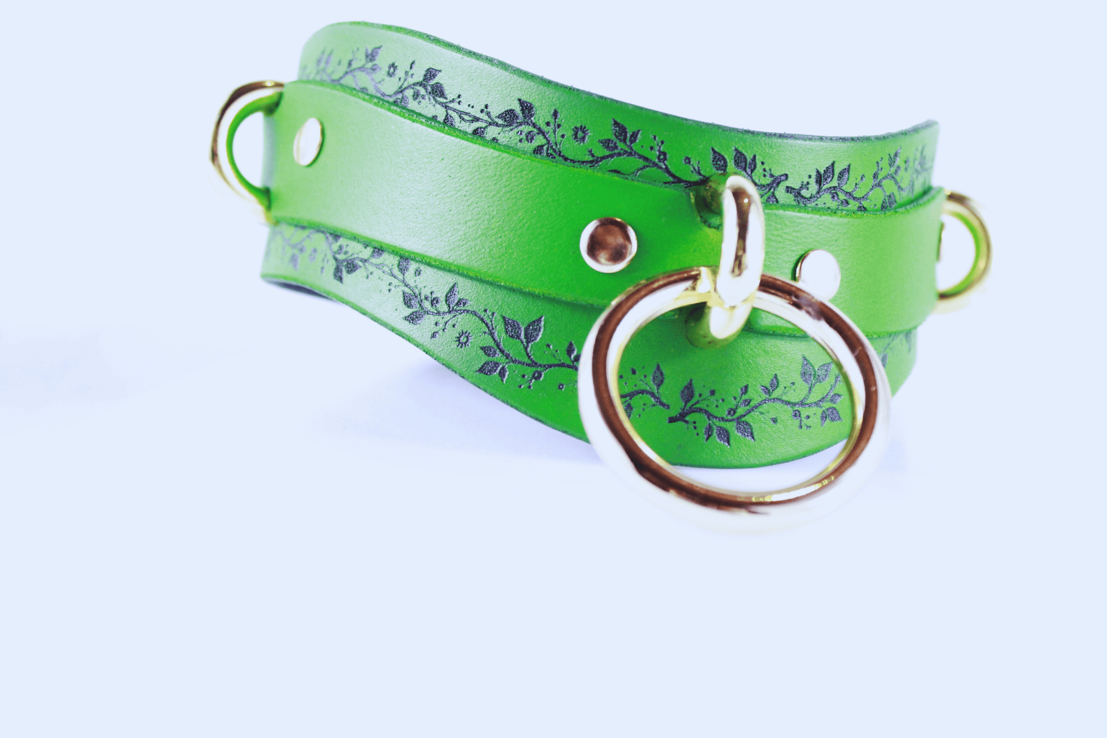 Green Vine Leather Submissive Collar with black vine pattern and polished rings, perfect for discreet day wear.
