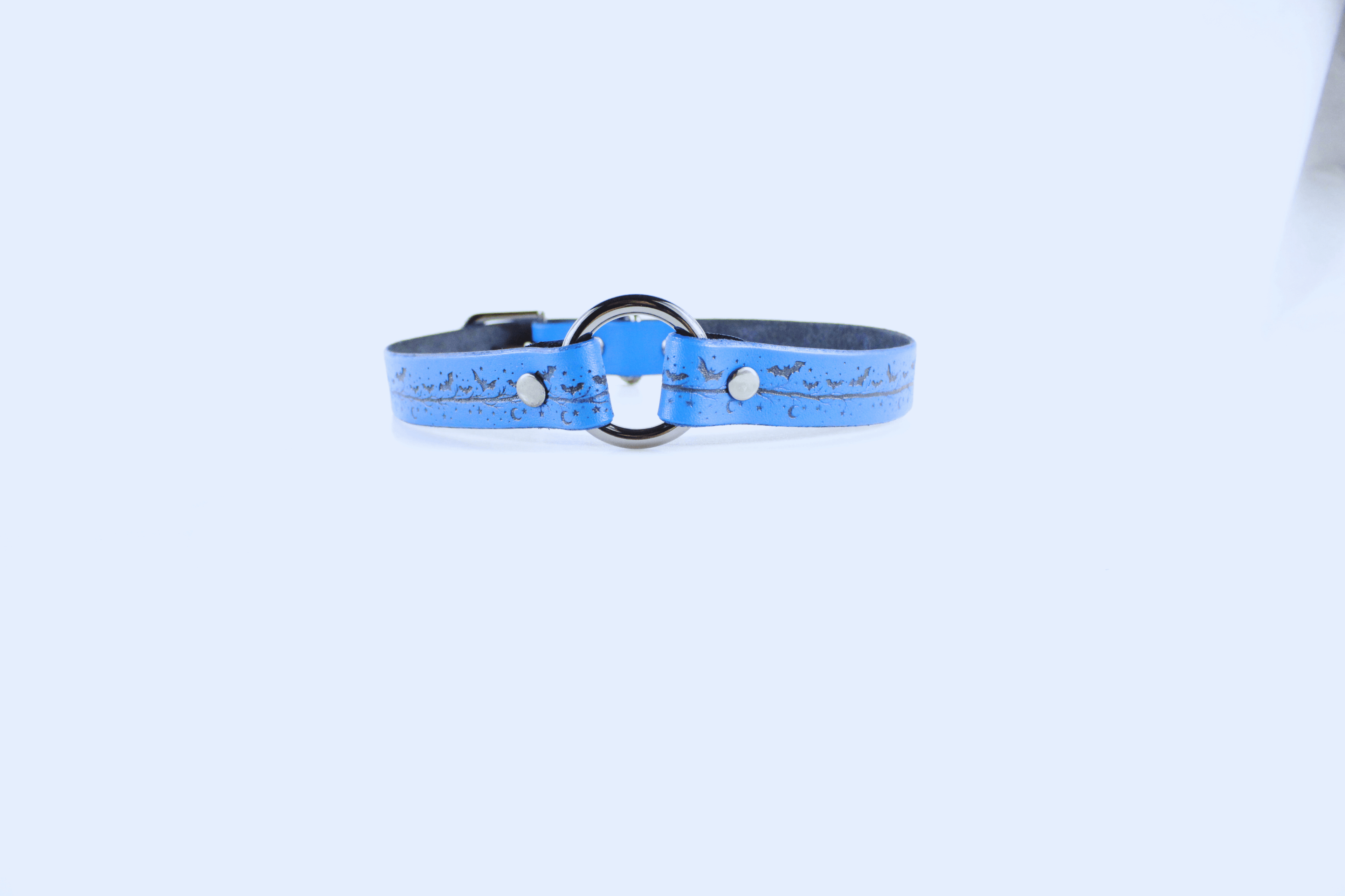 BDSM Collar Blue Moon & Bats Leather Choker featuring a blue design with crescent moons and bats.