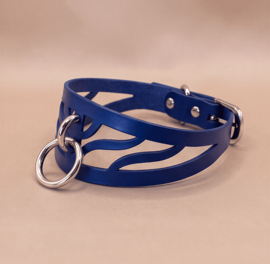 A blue leather choker necklace with metal rings and a metal buckle.