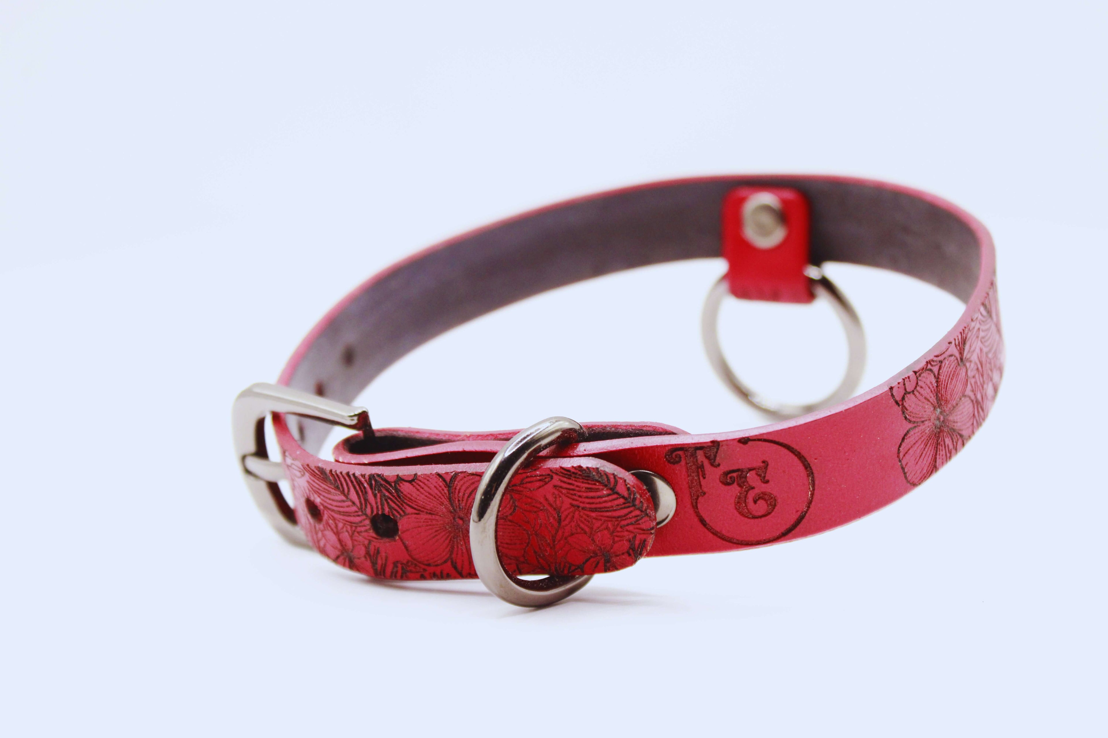 Red floral leather choker collar with adjustable buckle and D-ring for submissive style. Handmade accessory for elegance.