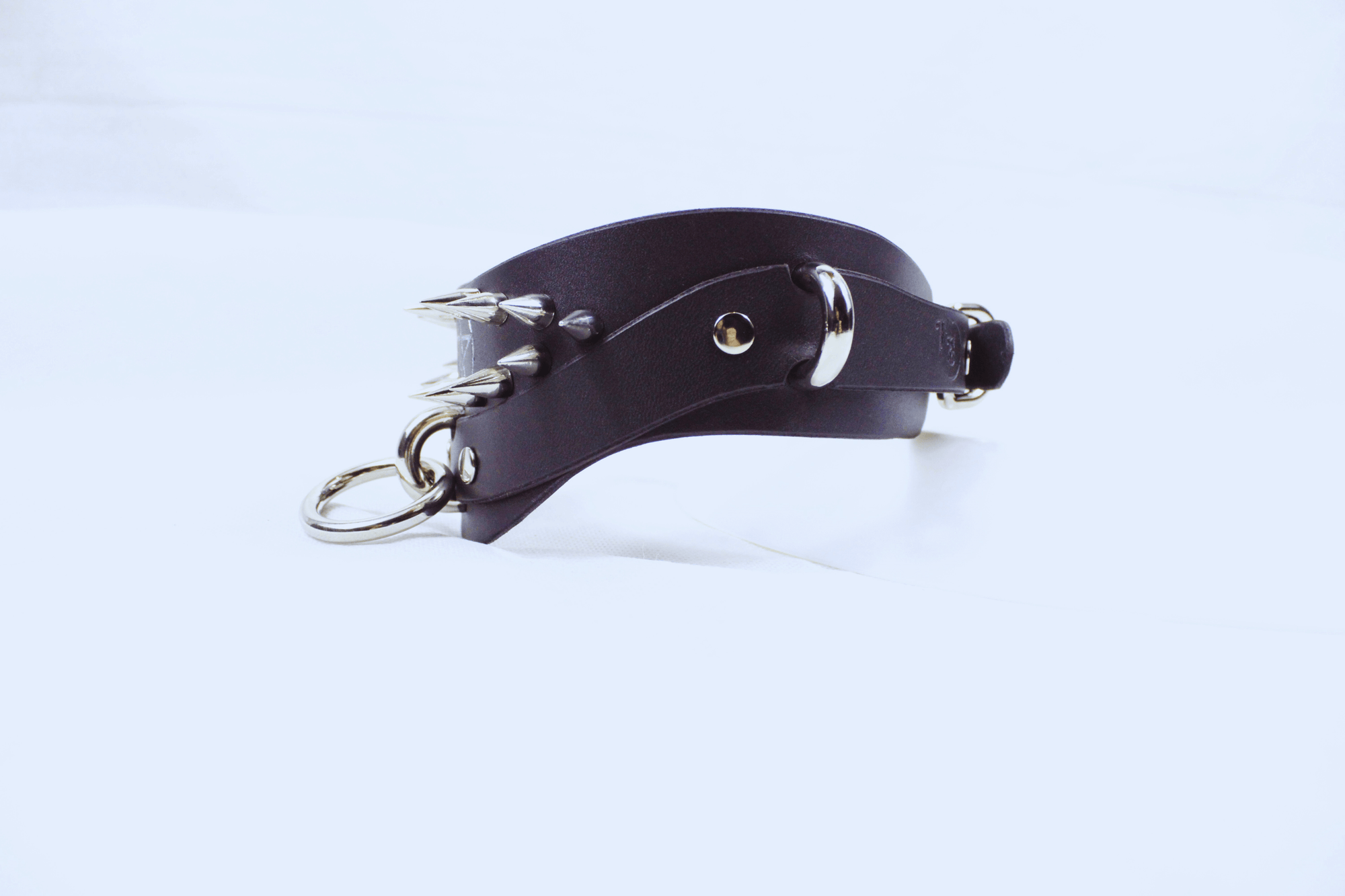 Pentagram BDSM Collar featuring sharp spikes, handcrafted black leather, gothic design for submissive wear.