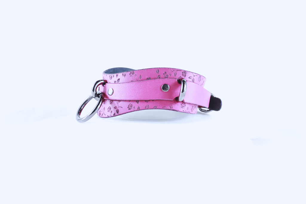 Rose Leather Submissive Collar – delicate pink leather collar with floral design.