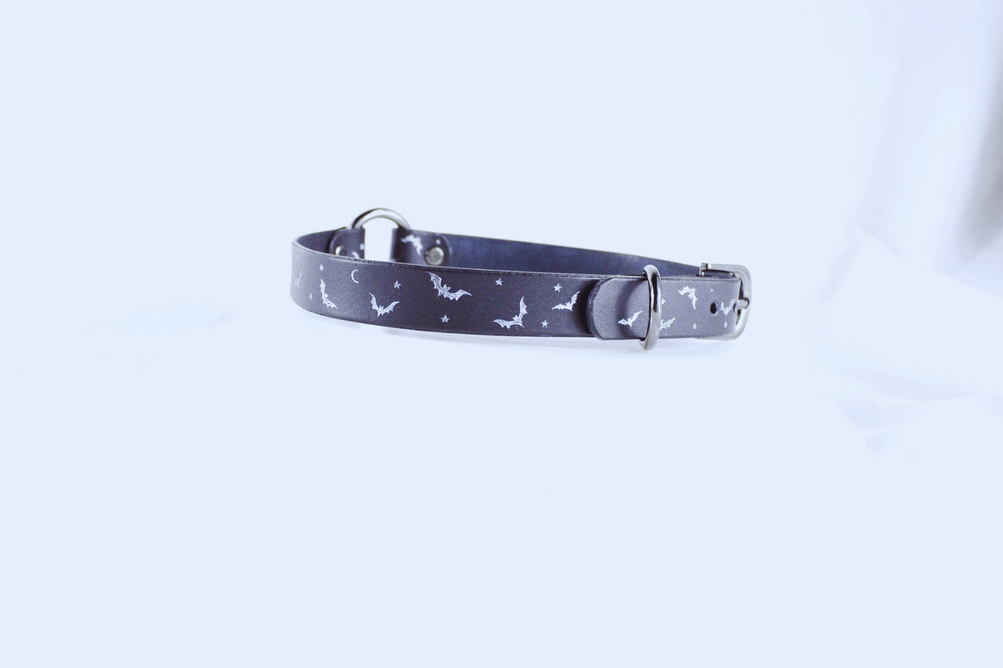 Bat and Moon Leather Choker featuring bats and crescent moons on supple leather.
