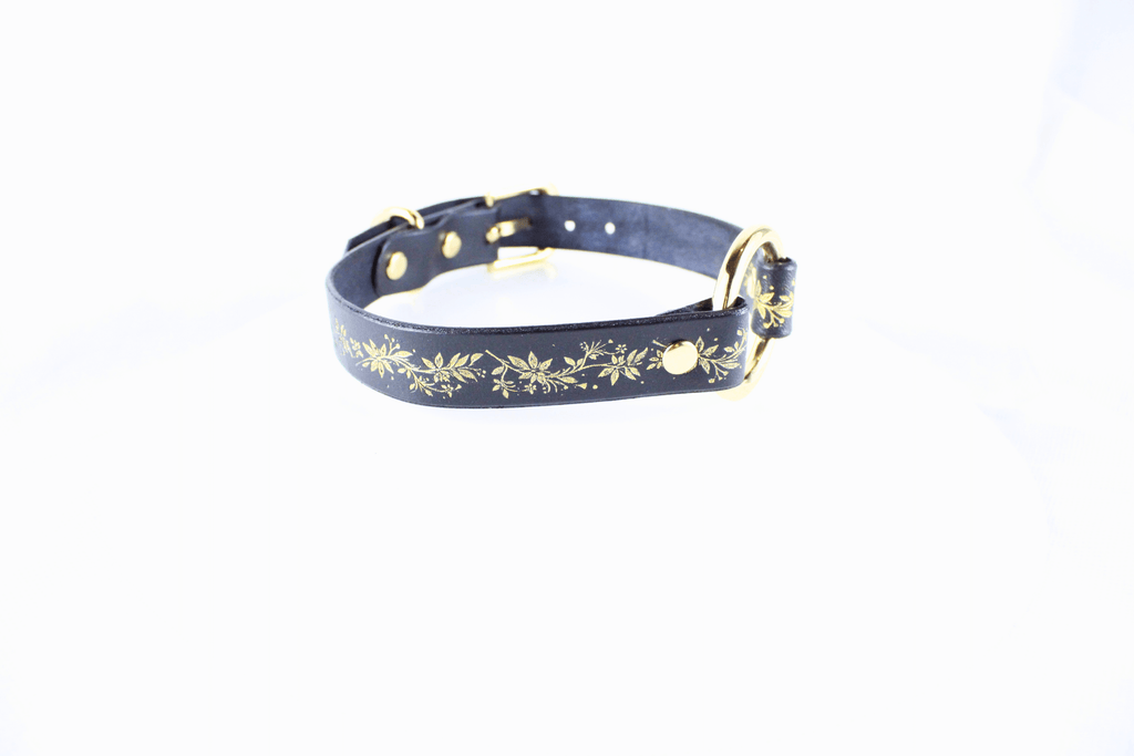 Black Leather Fetish Collar with golden floral pattern, elegant design with polished O-ring, perfect for stylish bondage.