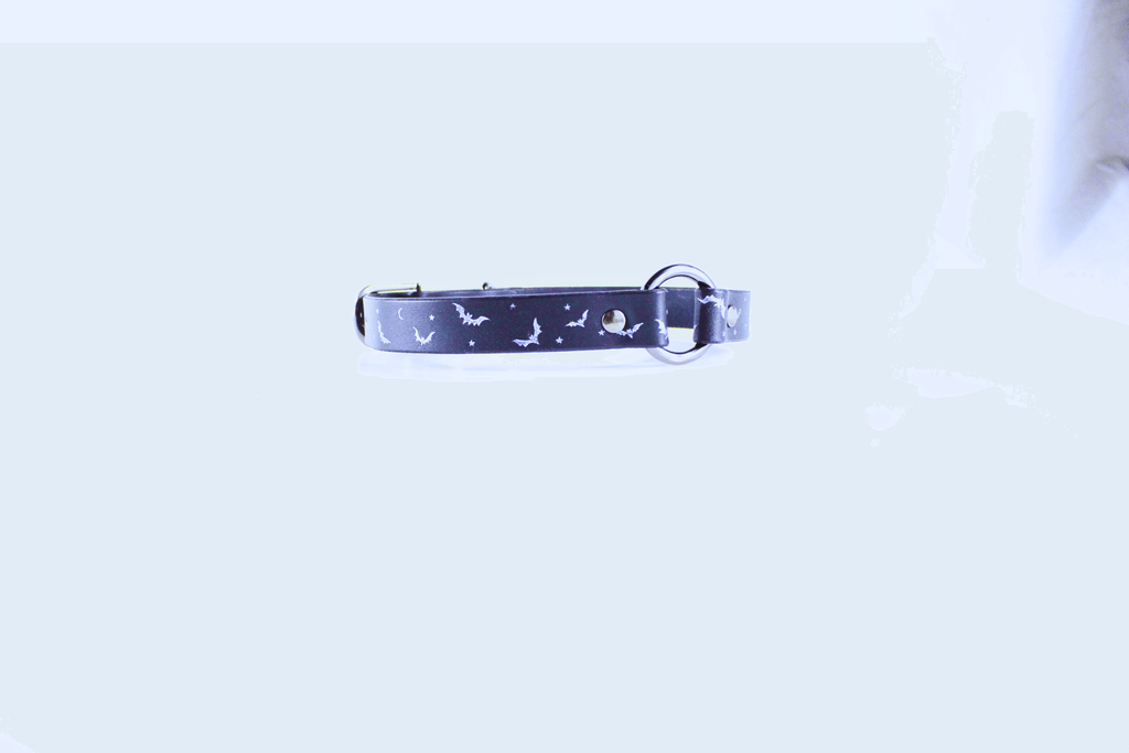 Bat and Moon Leather Choker featuring bats and crescent moons on a dark leather band.